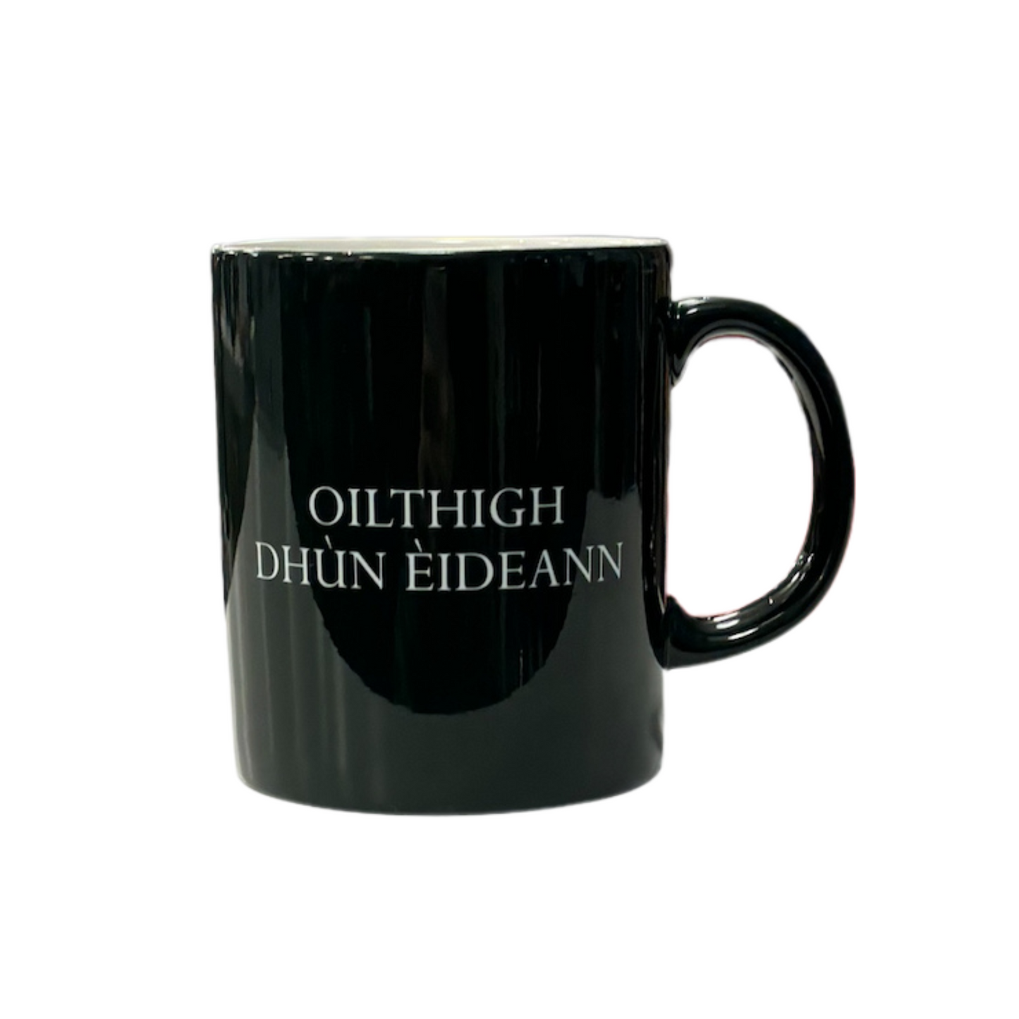 dark green mug with white text reading 'Oilthigh Dhùn Èideann'. Oilthigh Dhùn Èideann means the University of Edinburgh in Scottish Gaelic.