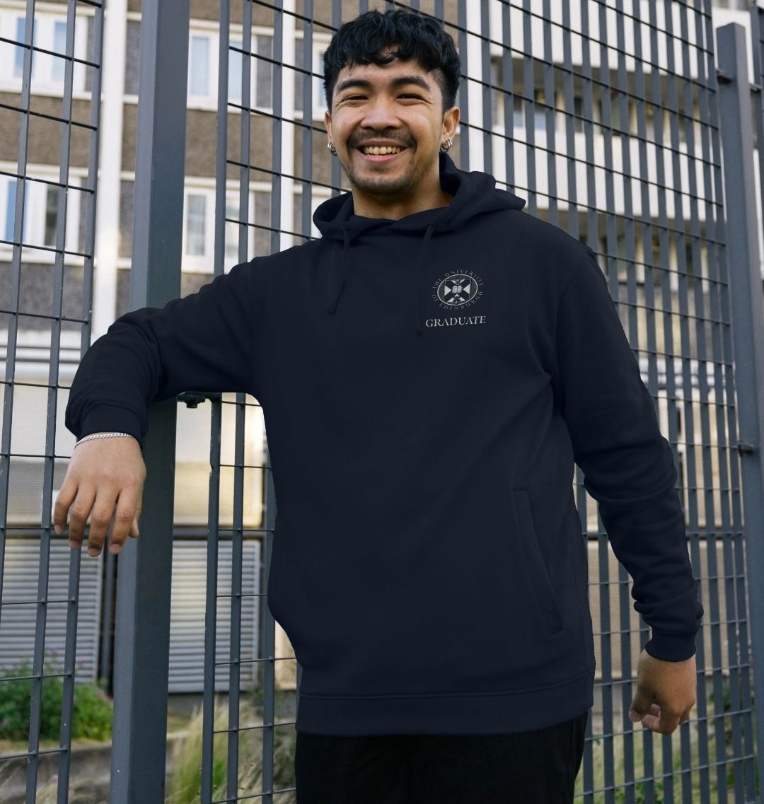 Model wears Navy School of Economics 'Class Of' Graduate Hoodie showing front design.