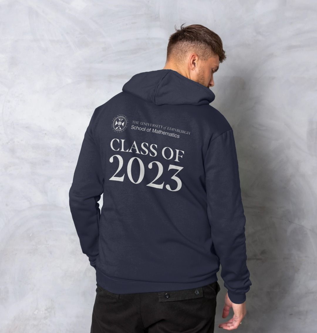 Model wears Navy School of Mathematics 'Class Of' Graduate Hoodie showing back design.