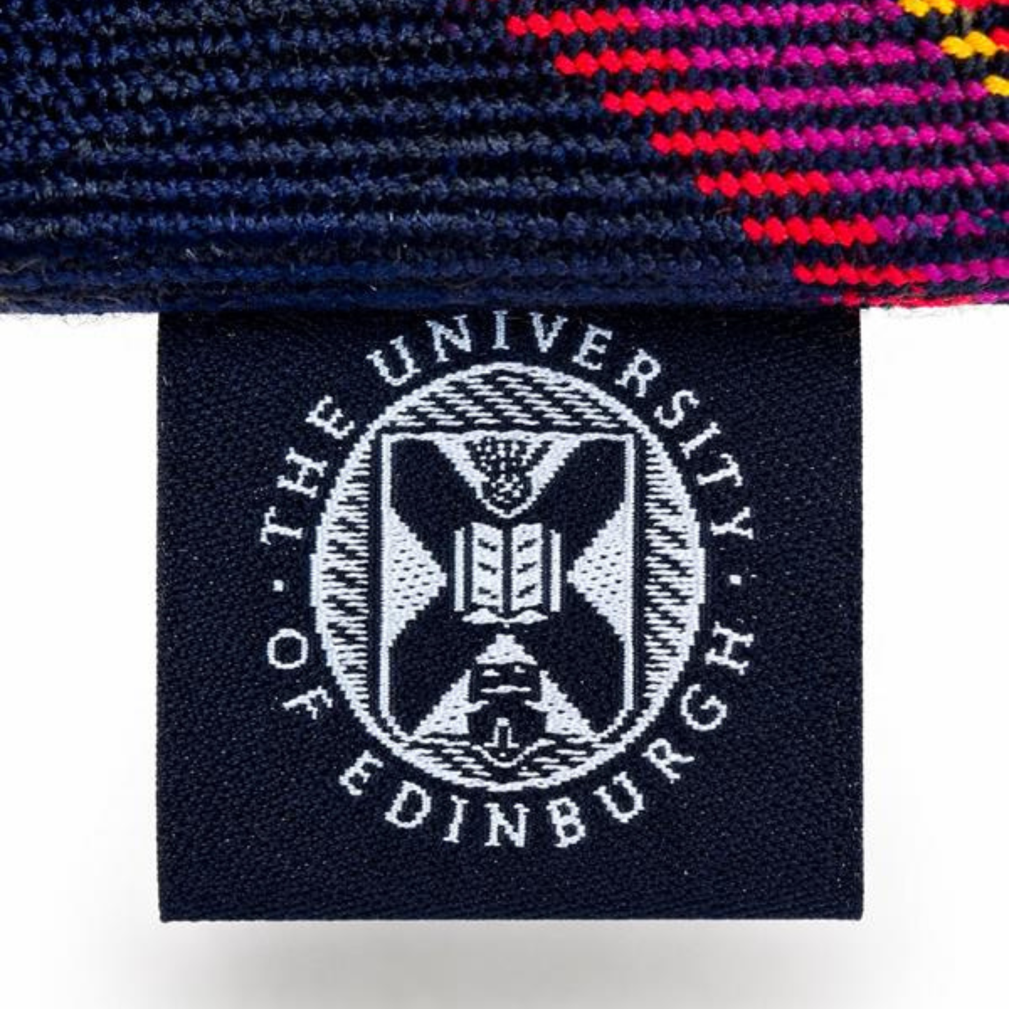 Close up of University of Edinburgh label on wash bag.