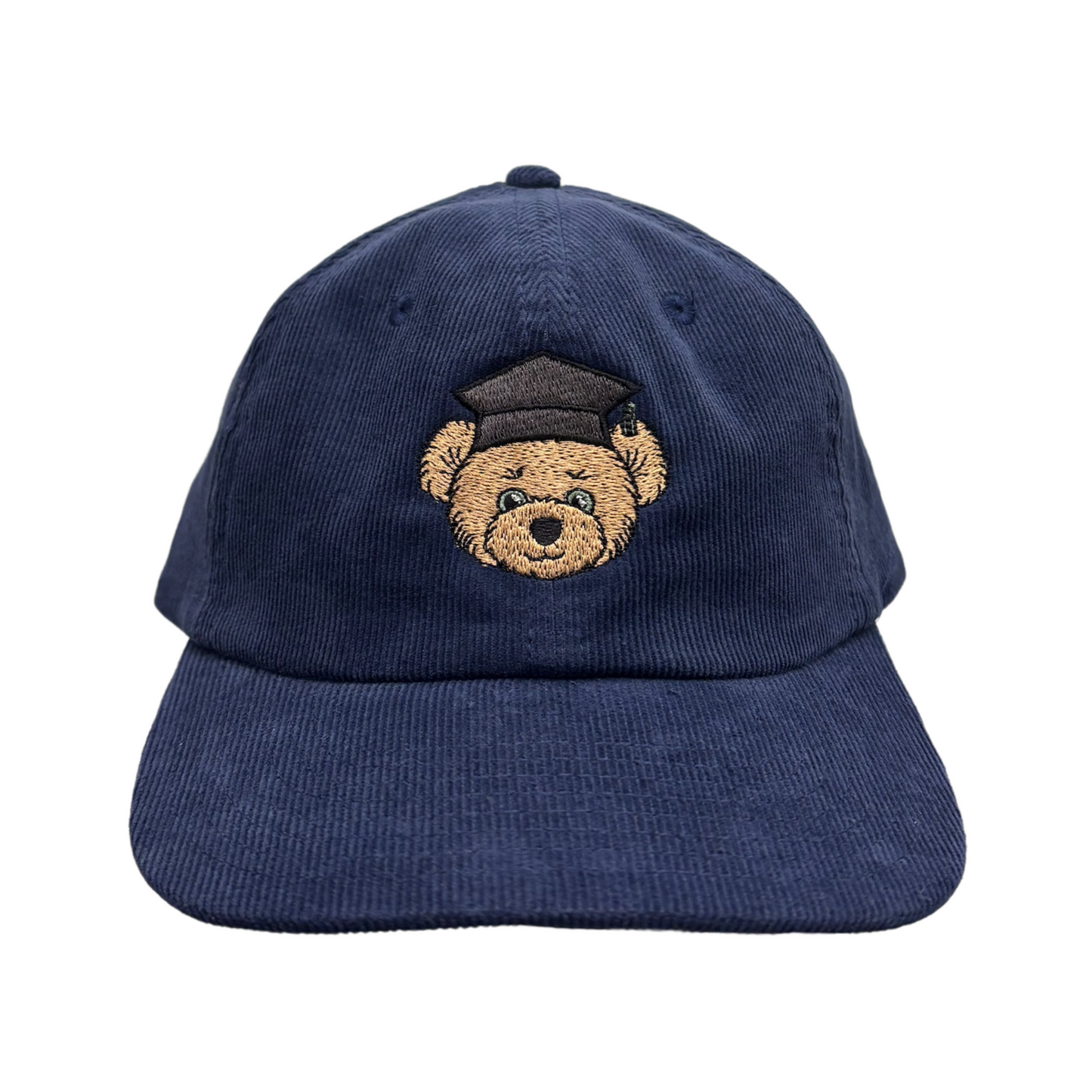 Front view of a navy blue baseball cap made from corduroy fabric, featuring Edinbear wearing a graduation cap on the front. The cap has a curved brim and a relaxed, unstructured fit.