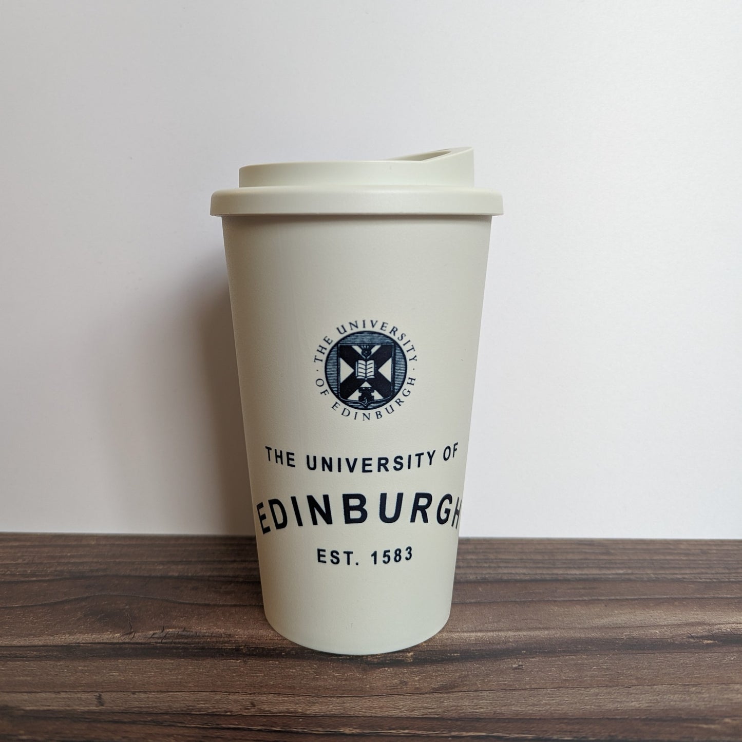 Eco Coffee Cup in White, with the design in Navy.