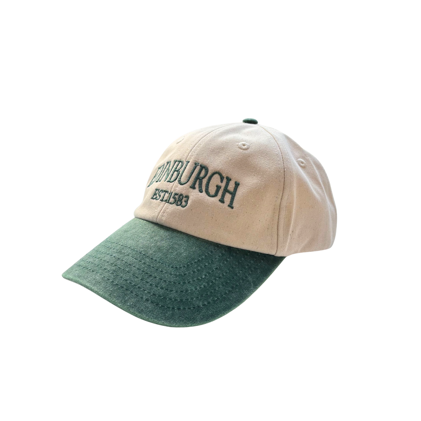 Side view of natural canvas cap with washed green peak and 'EDINBURGH EST. 1583' embroidered in green.