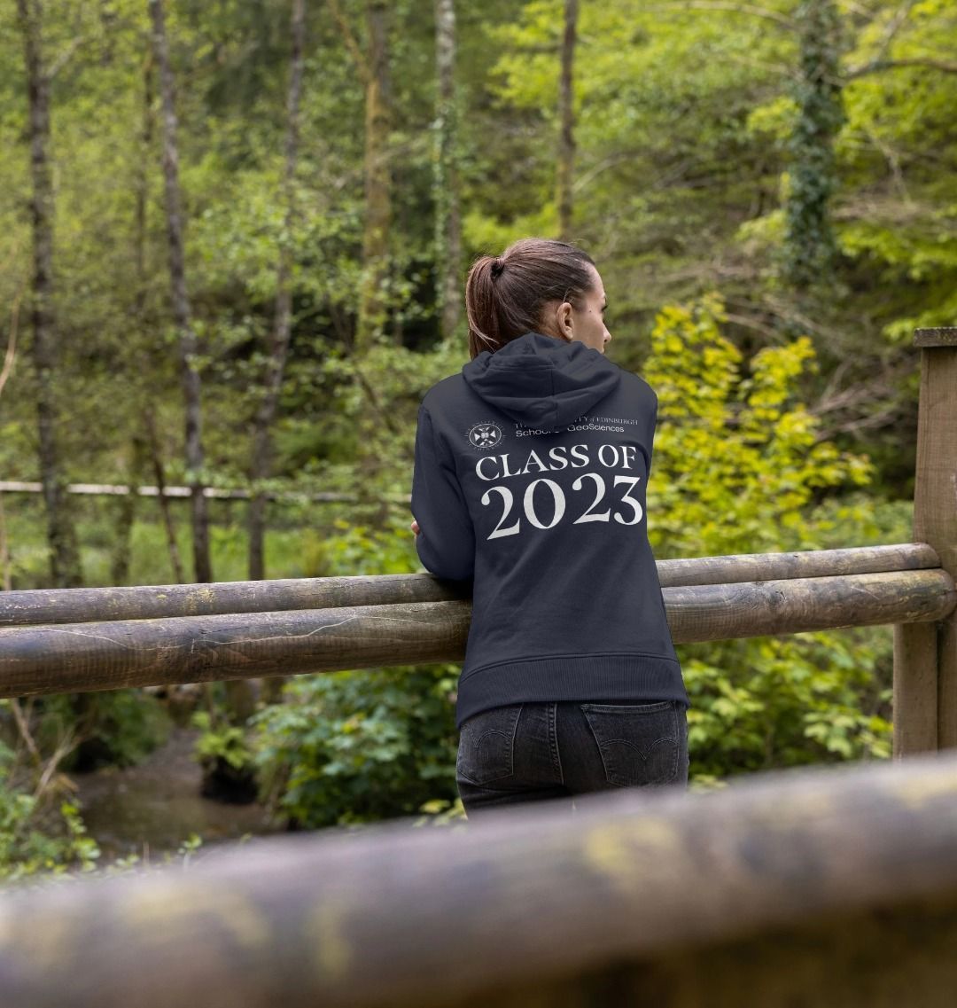 Model wears Navy School of GeoSciences 'Class Of' Graduate Hoodie showing back design.