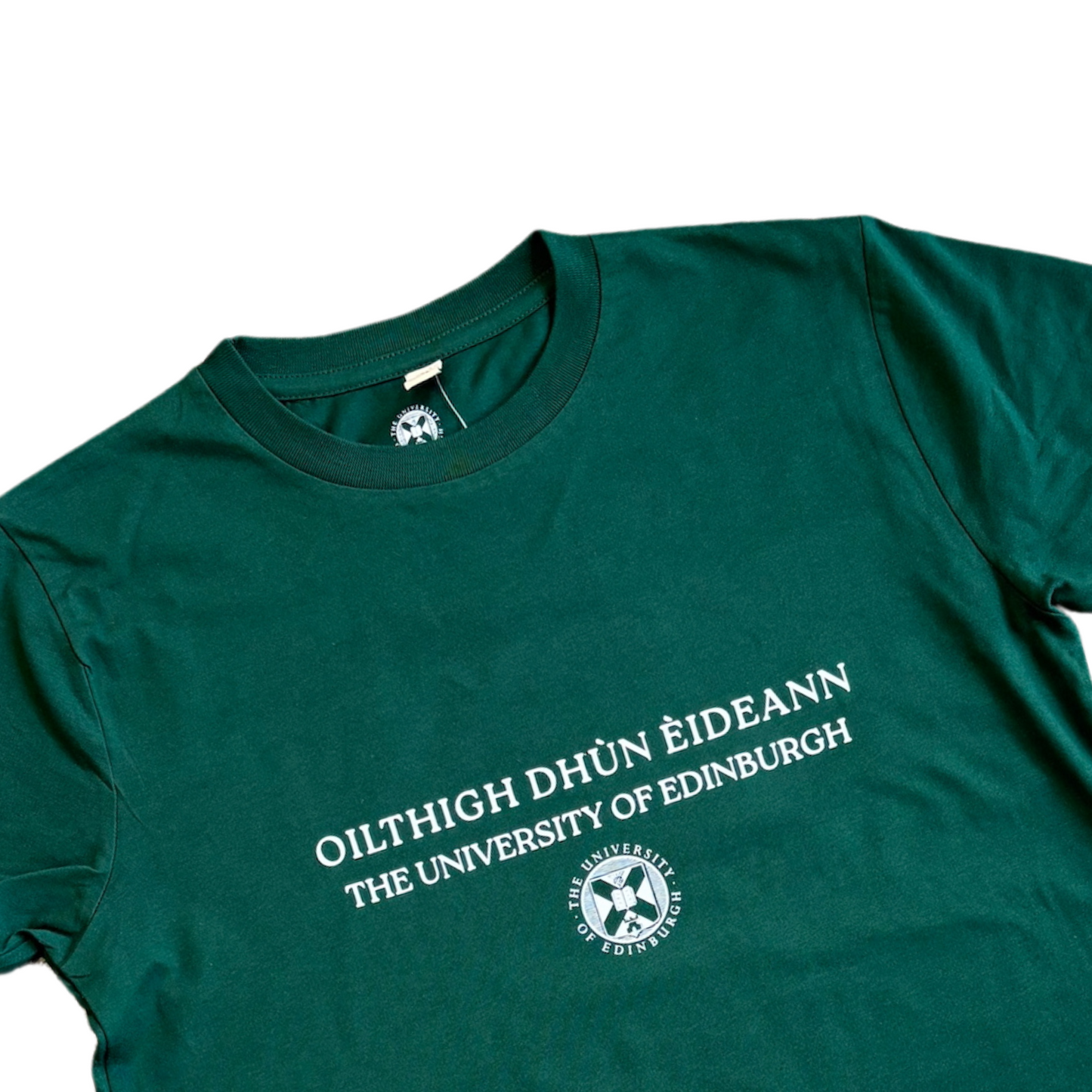 'OILTHIGH DHUN EIDEANN' and 'THE UNIVERSITY OF EDINBURGH' above the University crest in white print on a forest green t-shirt.