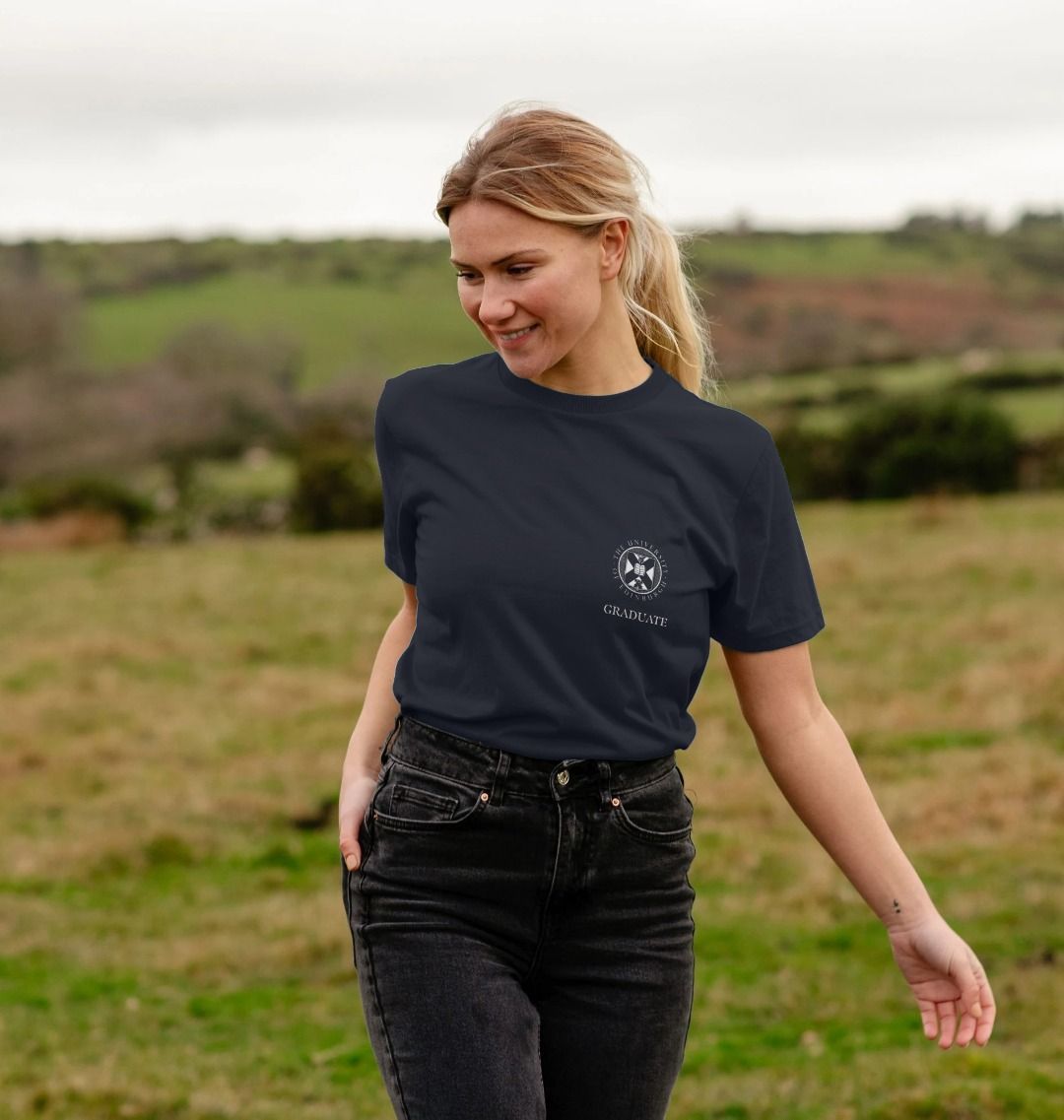 Model wears Navy Blue School of Engineering 'Class Of' Graduate T-Shirt showing front design.