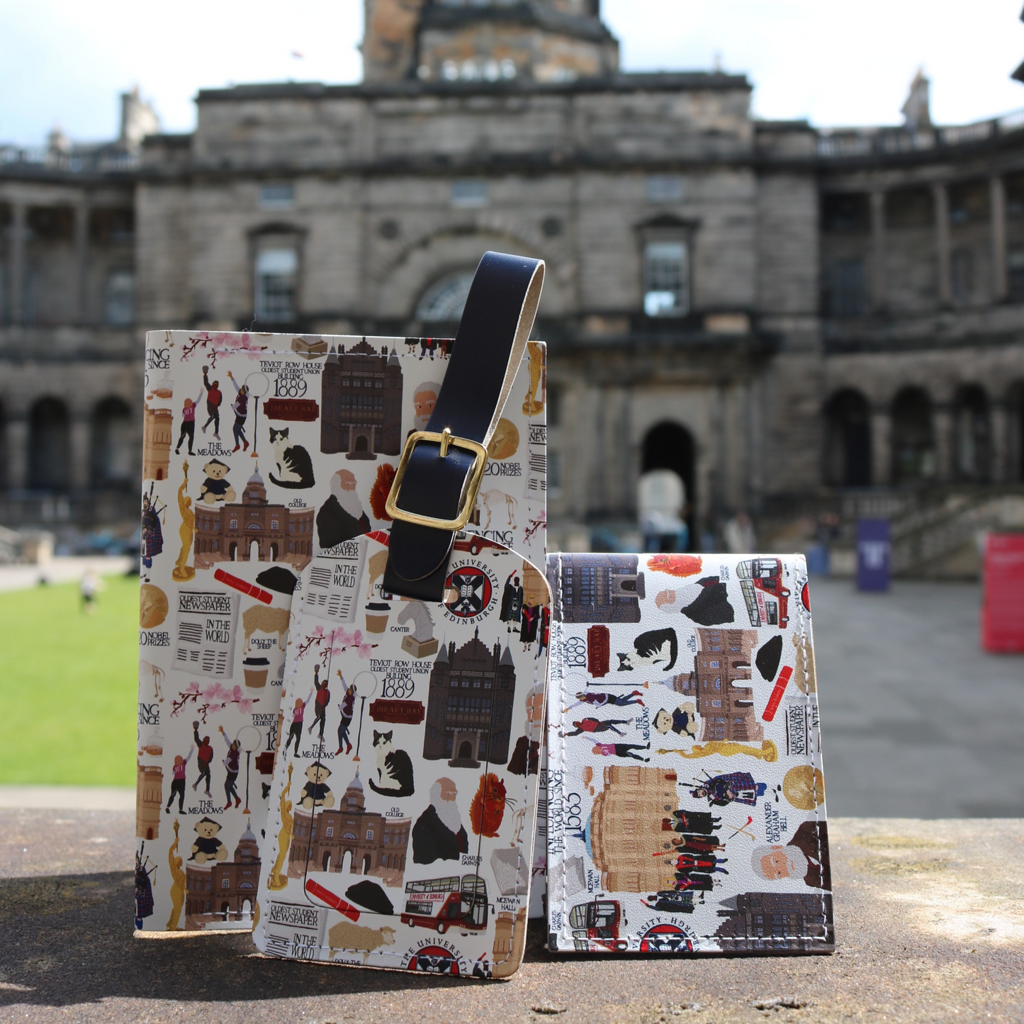 The Heritage Collection passport holder, travel card holder and luggage tag pictured in the Old College Quad.