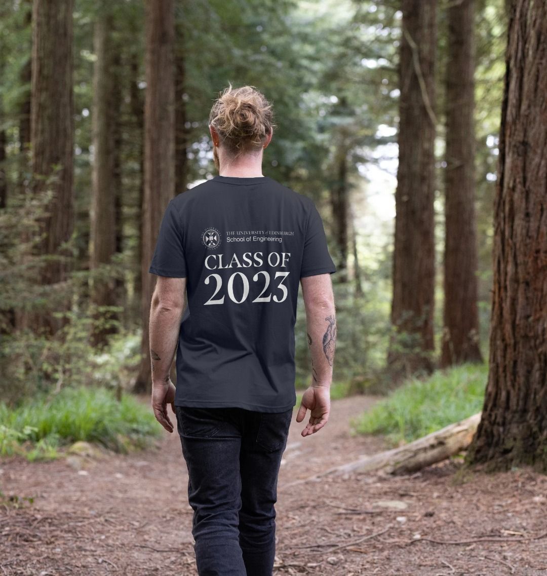 Model wears Navy Blue School of Engineering 'Class Of' Graduate T-Shirt showing back design.