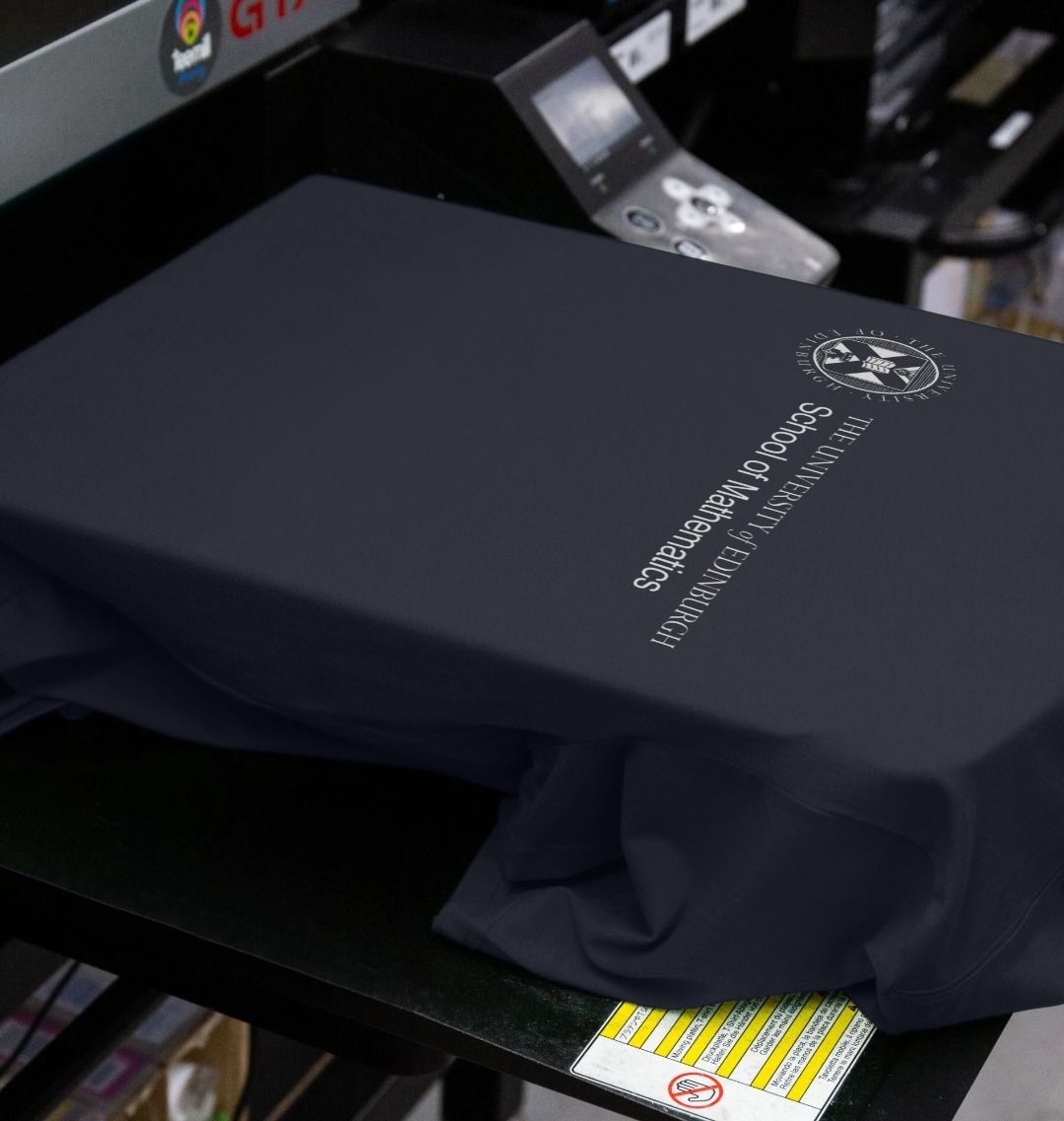 Our School of Mathematics T Shirt being printed by our print on demand partner, teemill.