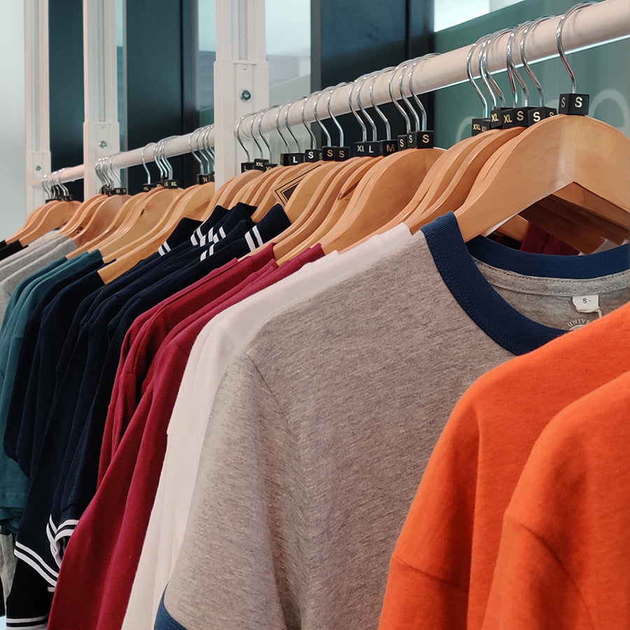 T-shirts on a clothing rack