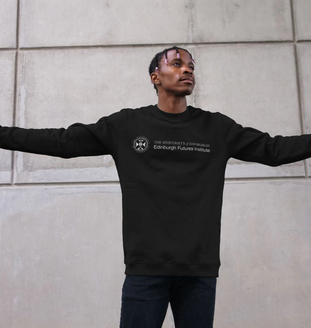 Model wears Black Edinburgh Futures Institute Sweatshirt in Black.