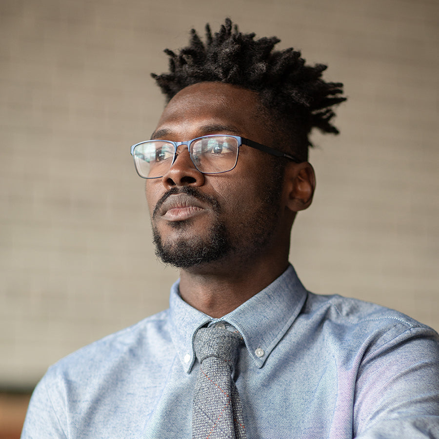 A model wearing the University tweed tie