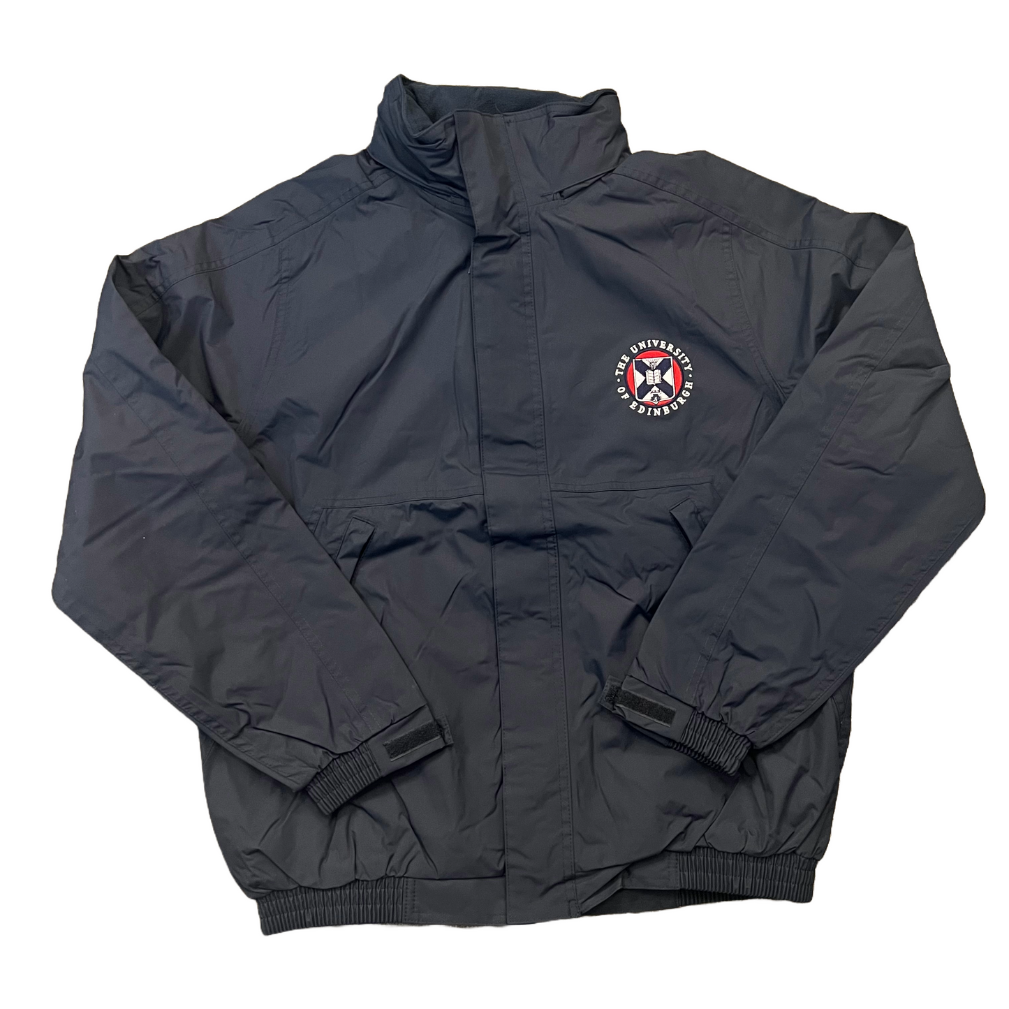 navy waterproof jacket with the University crest embroidered on the left chest in white, red and navy