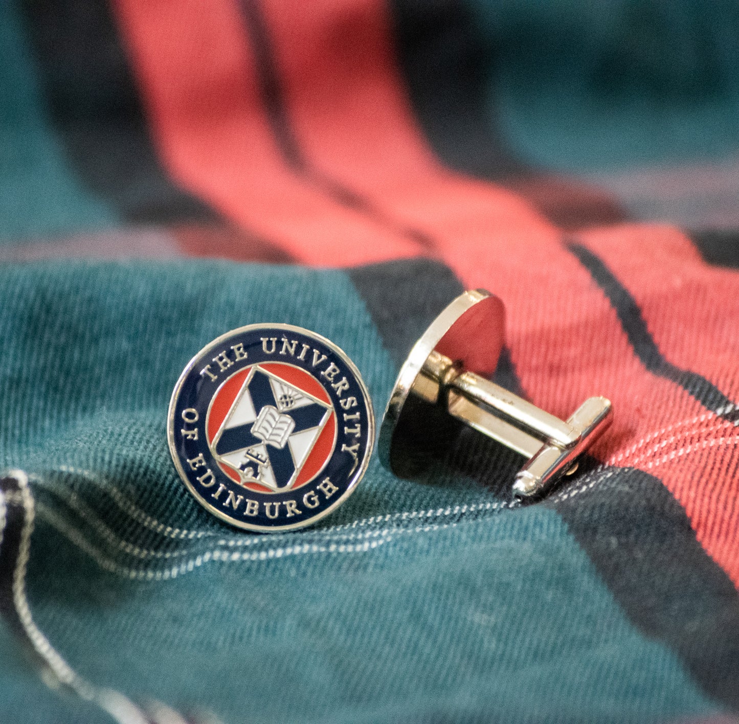 Our Enamel Cufflinks on a tartan background.