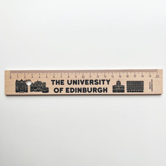 Wooden ruler with iconic university buildings printed on