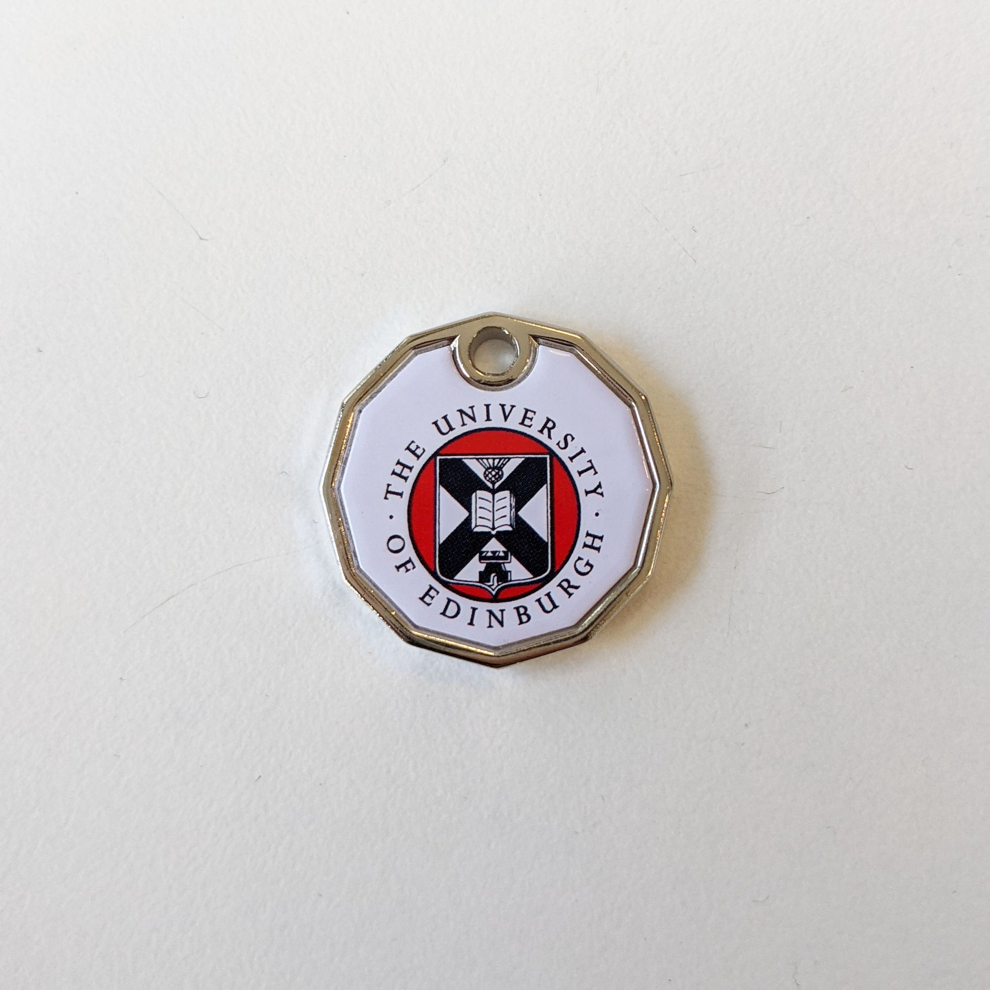 Coin keyring for use in supermarket trolleys with full colour University crest