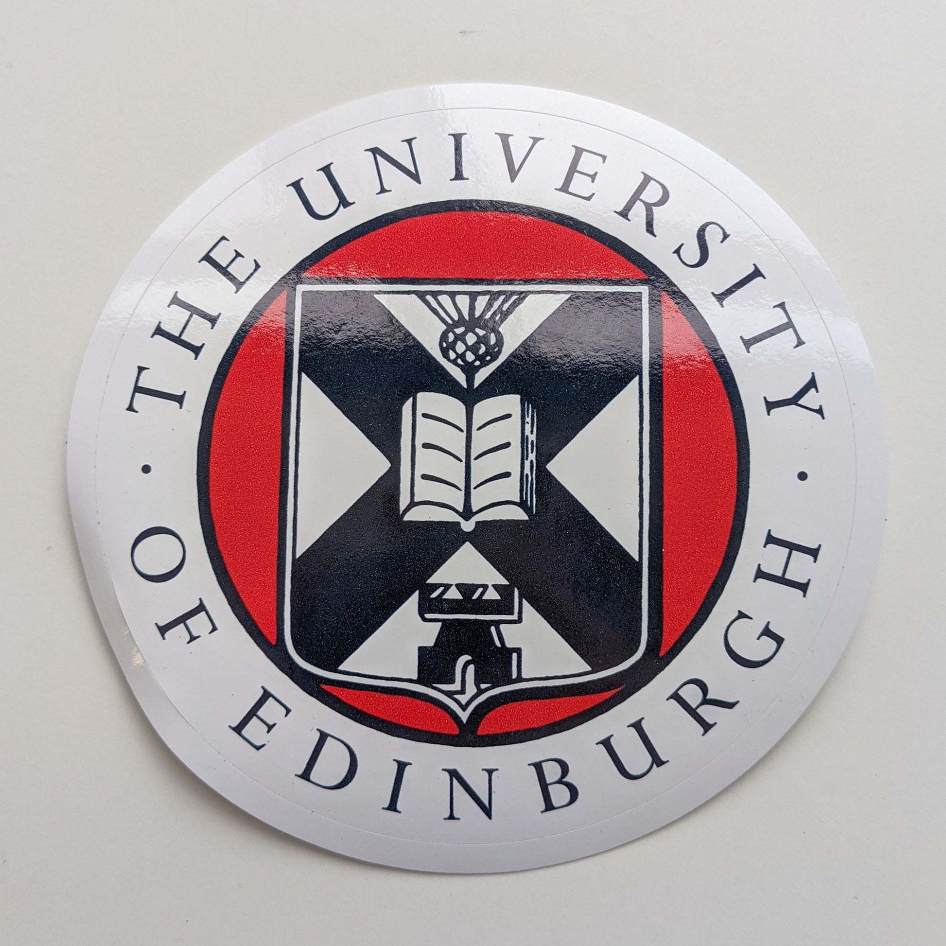 Vinyl sticker of the crest in full colour print. 