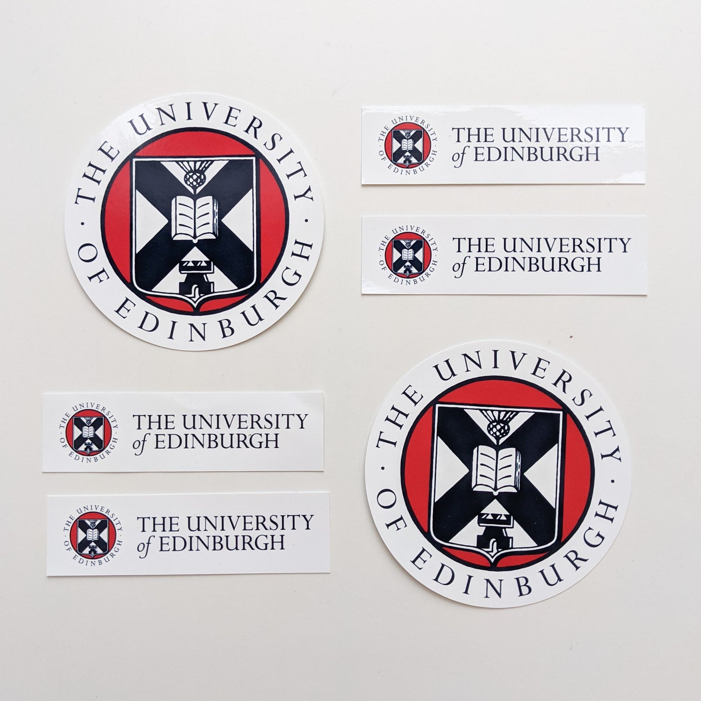 Our Round and Long Window Stickers laid in a pattern on a white background.