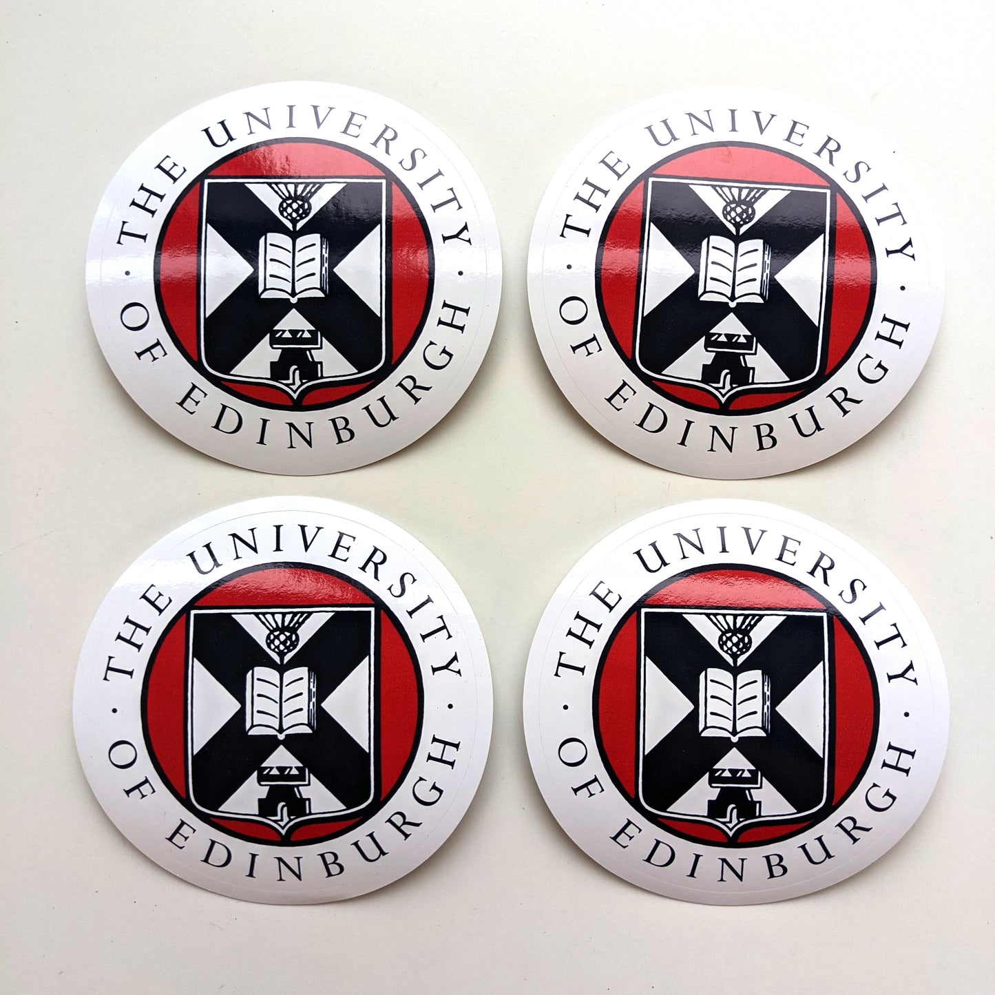 Four of our Round Laptop Stickers.