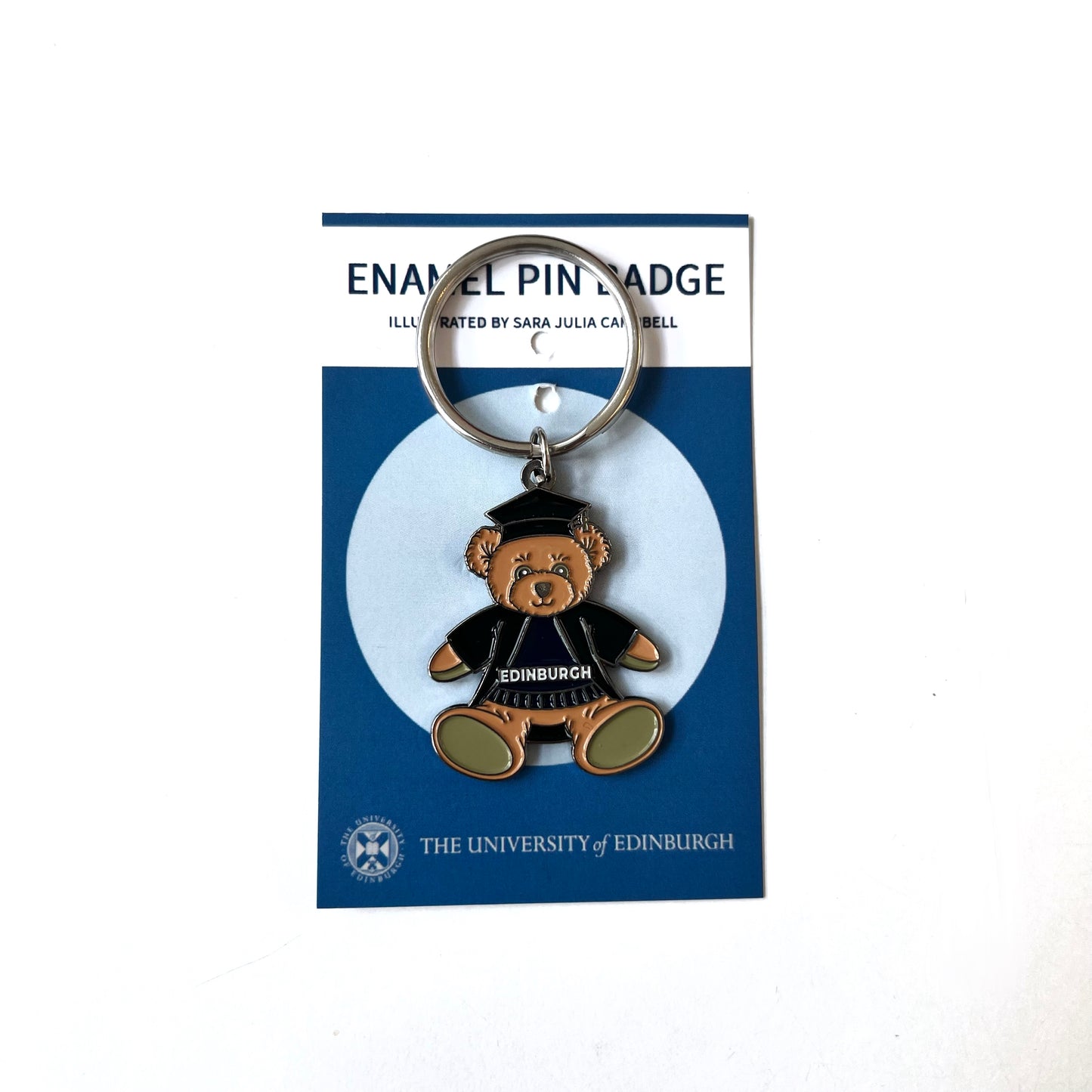 Enamel edinbear keyring wearing graduation robe and hat