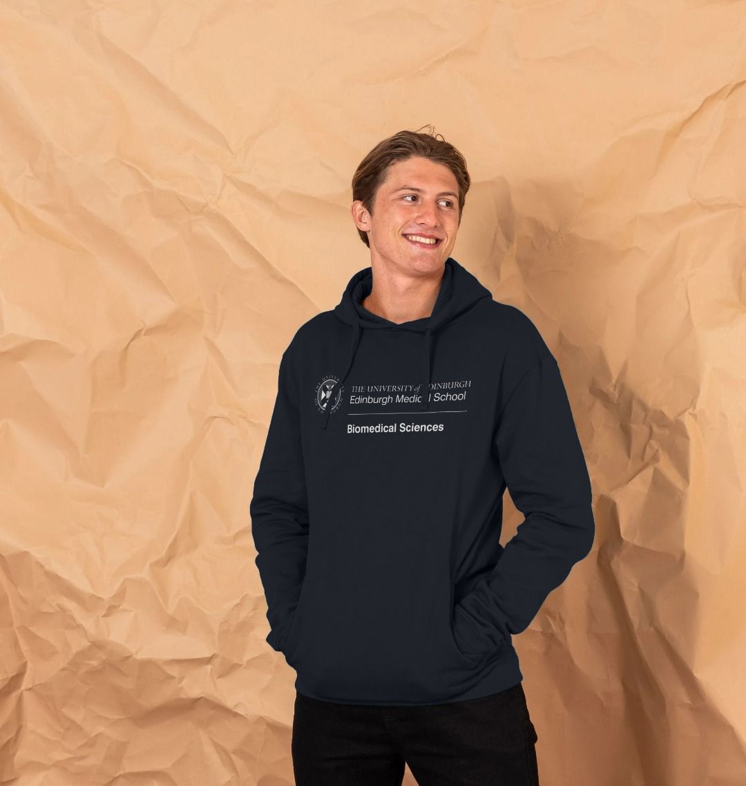 A model wearing our Edinburgh Medical School - Biomedical Sciences Hoodie 