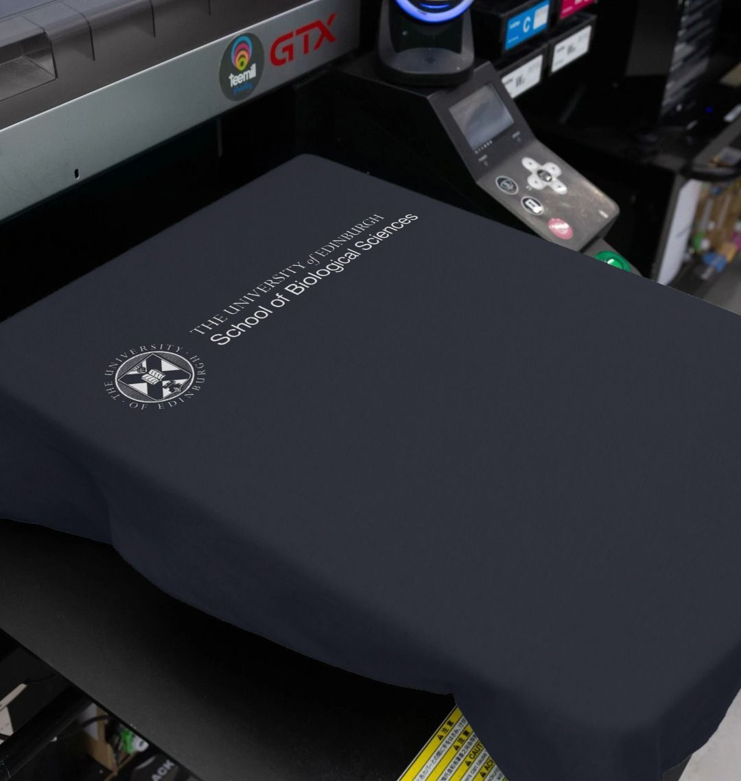 Our School of Biological Sciences T Shirt being printed by our print on demand partner, teemill