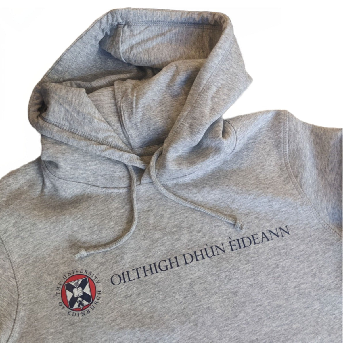 close up of Grey hoodie with the University name in Gaelic in navy print and university crest in navy red and white print