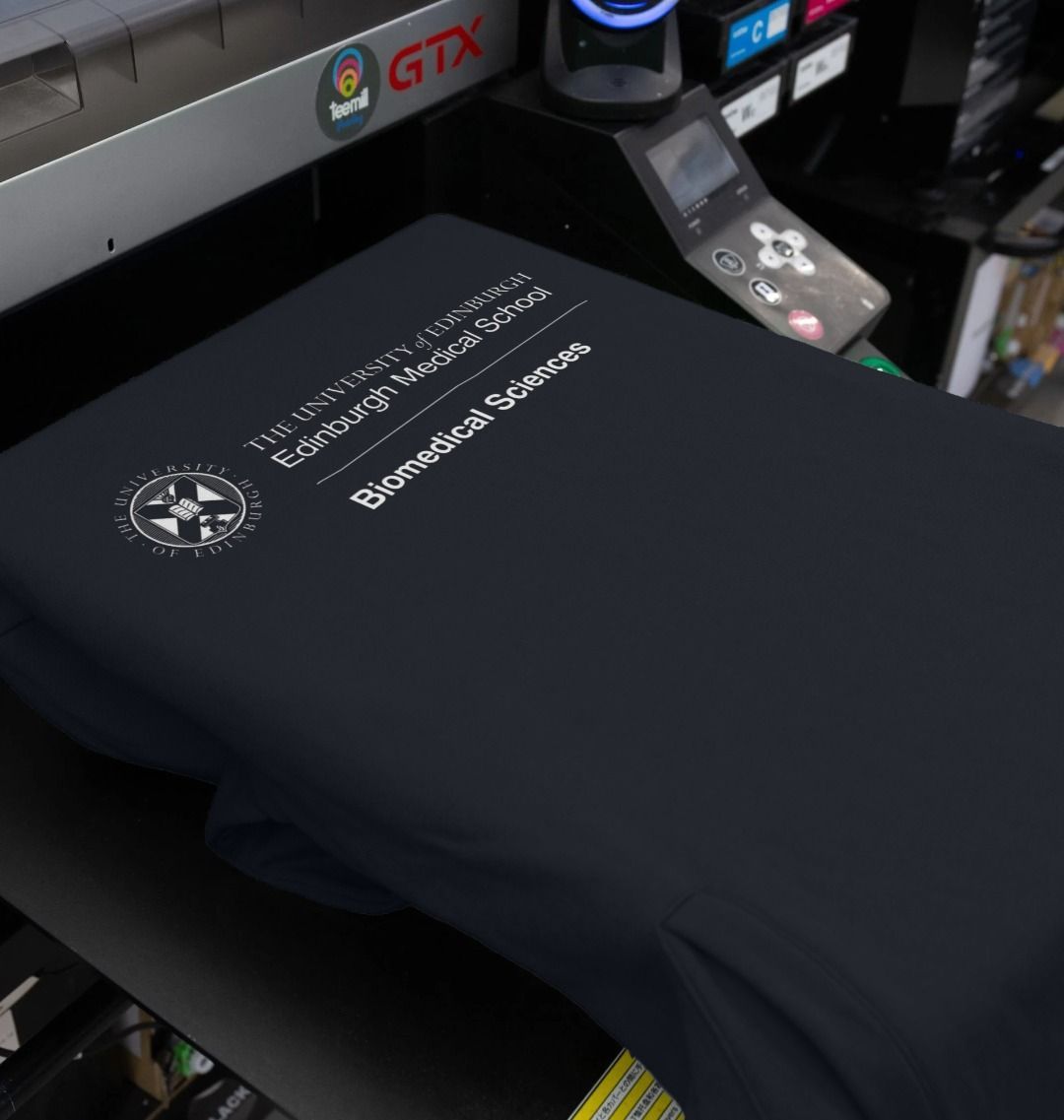 Our Edinburgh Medical School - Biomedical Sciences Hoodie being printed by our print on demand partner, teemill.