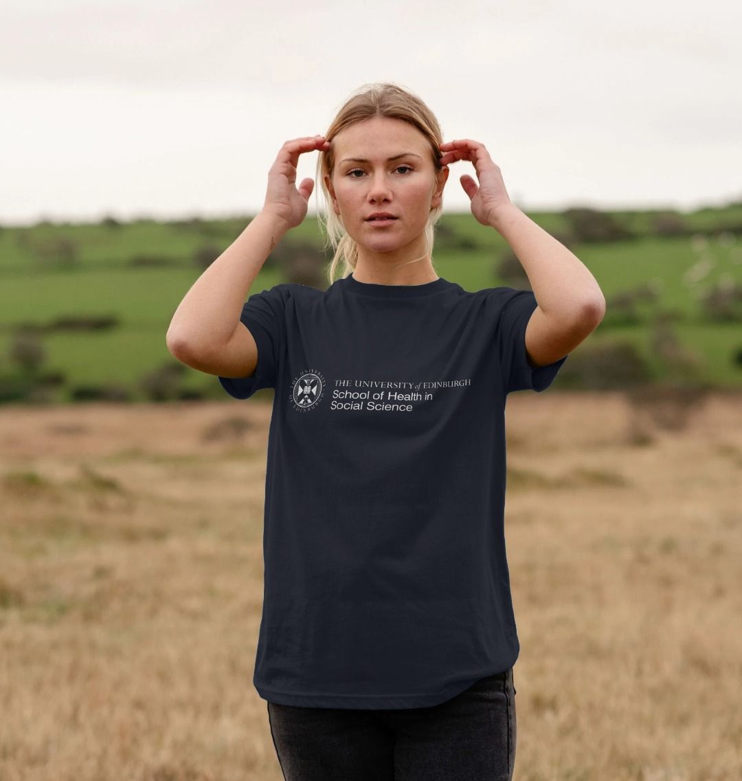 A model wearing our School of Health in Social Science  T-Shirt