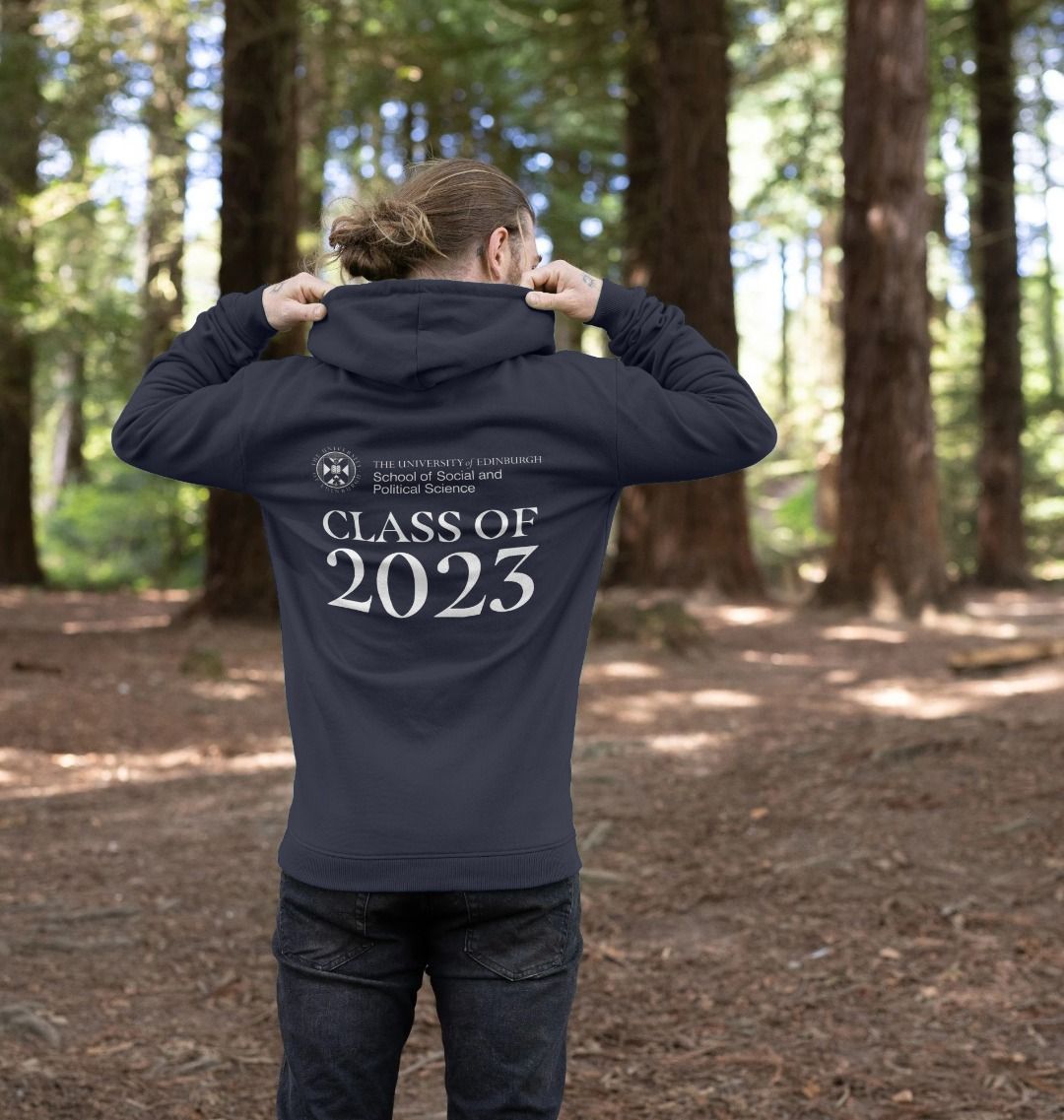 Model wears Navy School of Social and Political Science 'Class Of' Graduate Hoodie showing back design.