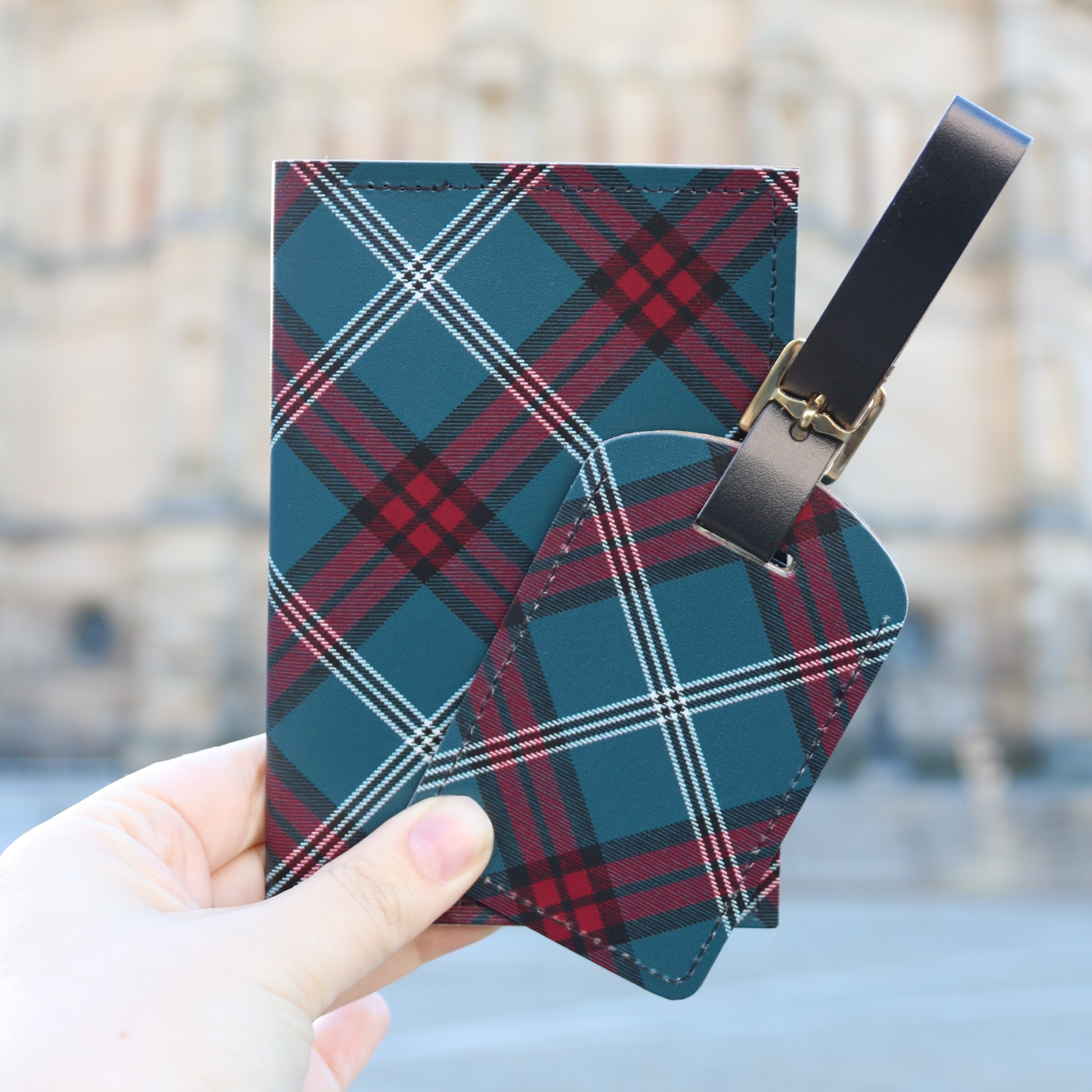 The tartan passport holder alongside the tartan luggage tag.