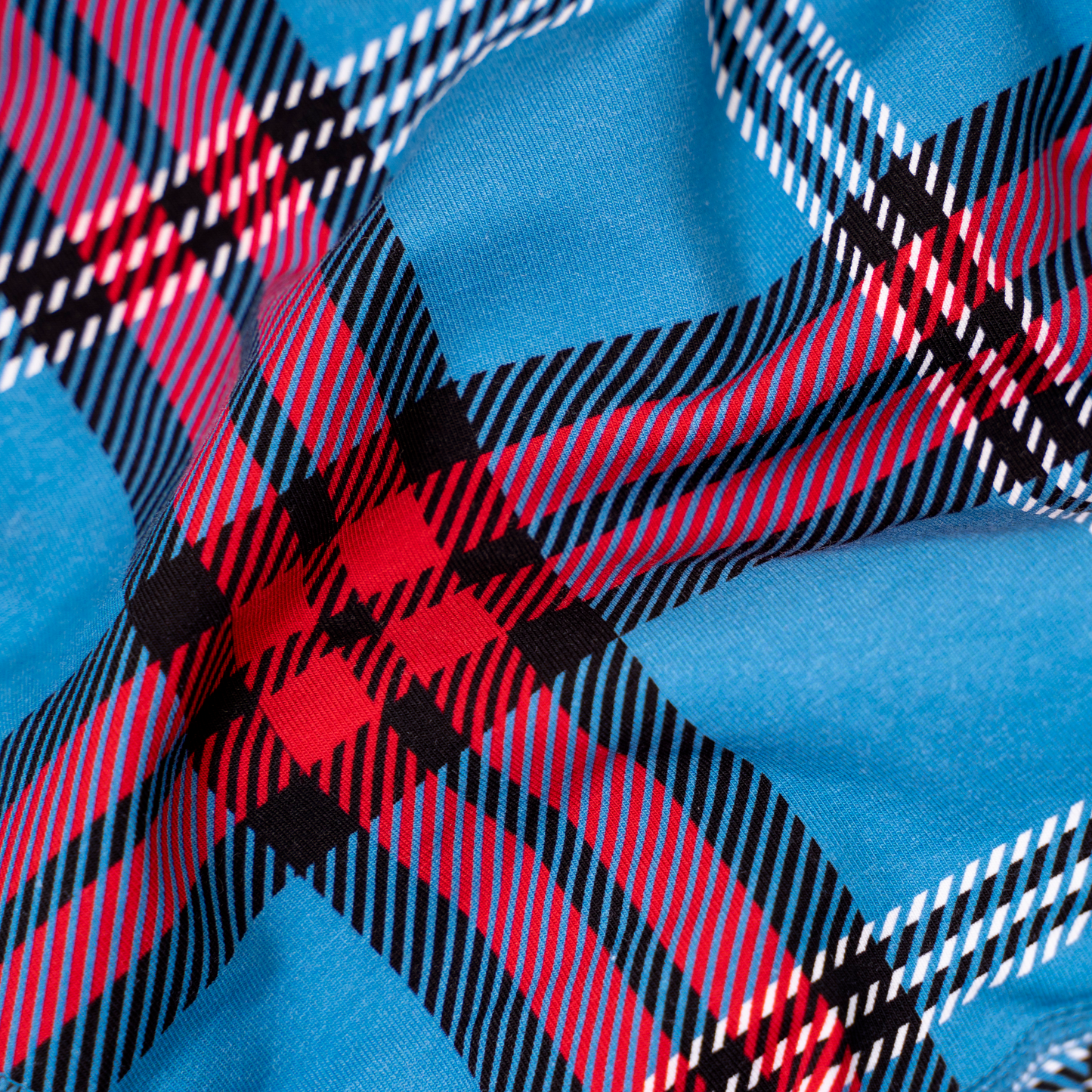 Close up of Edinburgh University tartan on bralette. 