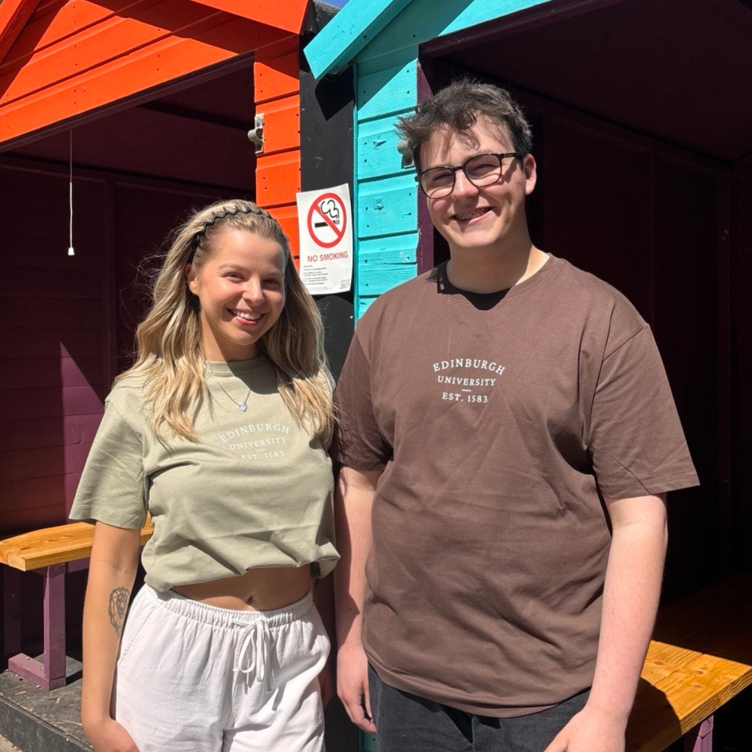 Man wears Everyday T-Shirt in Brown and woman wears Everyday T-Shirt in Light Olive.