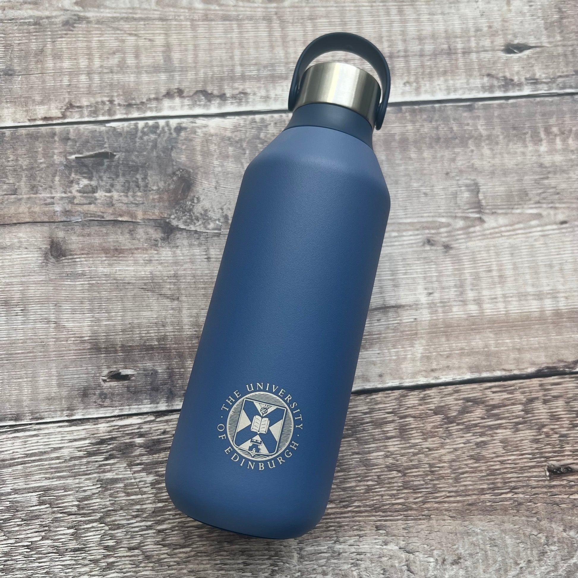 Blue chillys bottle with the university crest engraved