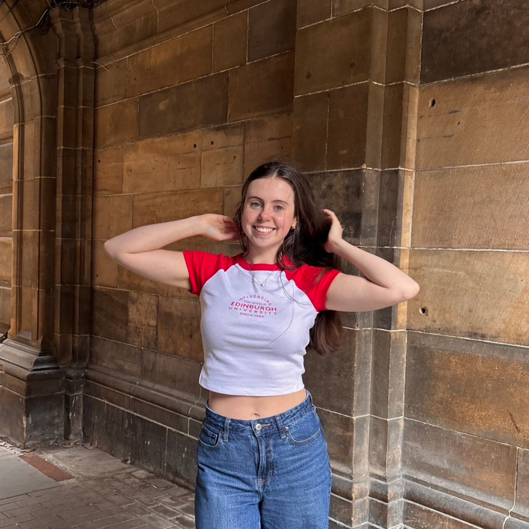 Woman wears Influencing Cropped Baseball T-Shirt