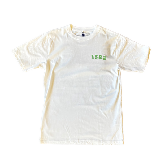 White oversized t-shirt featuring "1583" written in bubble text in matcha-green on the upper left chest area. 