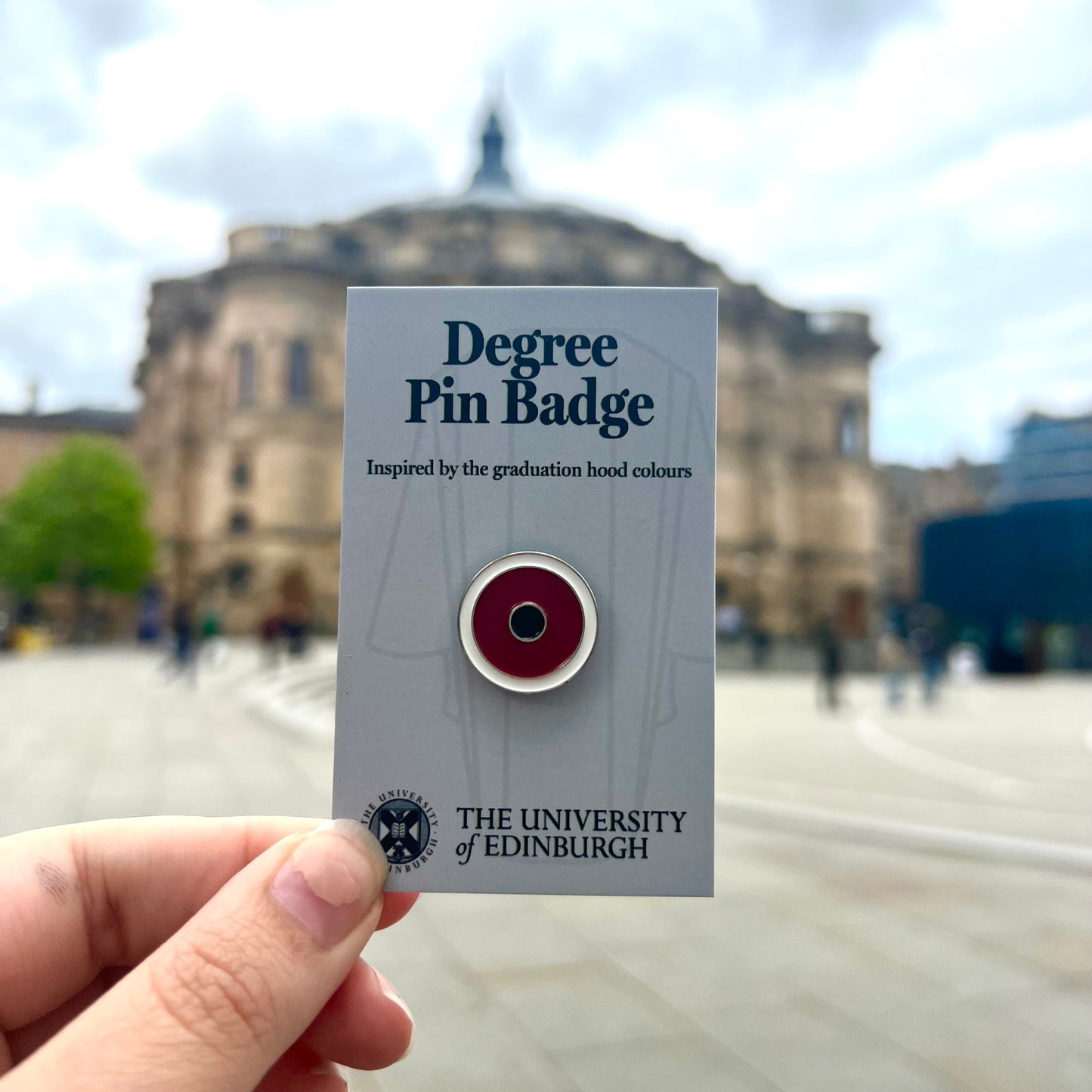 MBCHB: Round pin with white outer circle, dark red middle circle and black inner circle