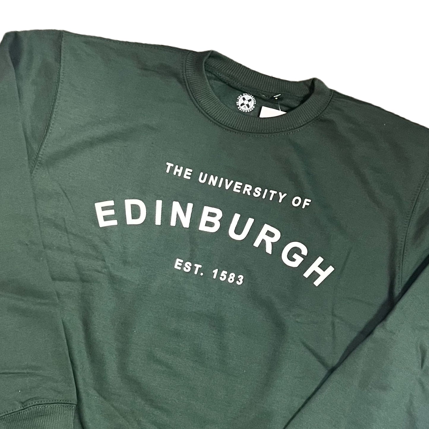 Close-up of text on Bottle Green Sweatshirt.