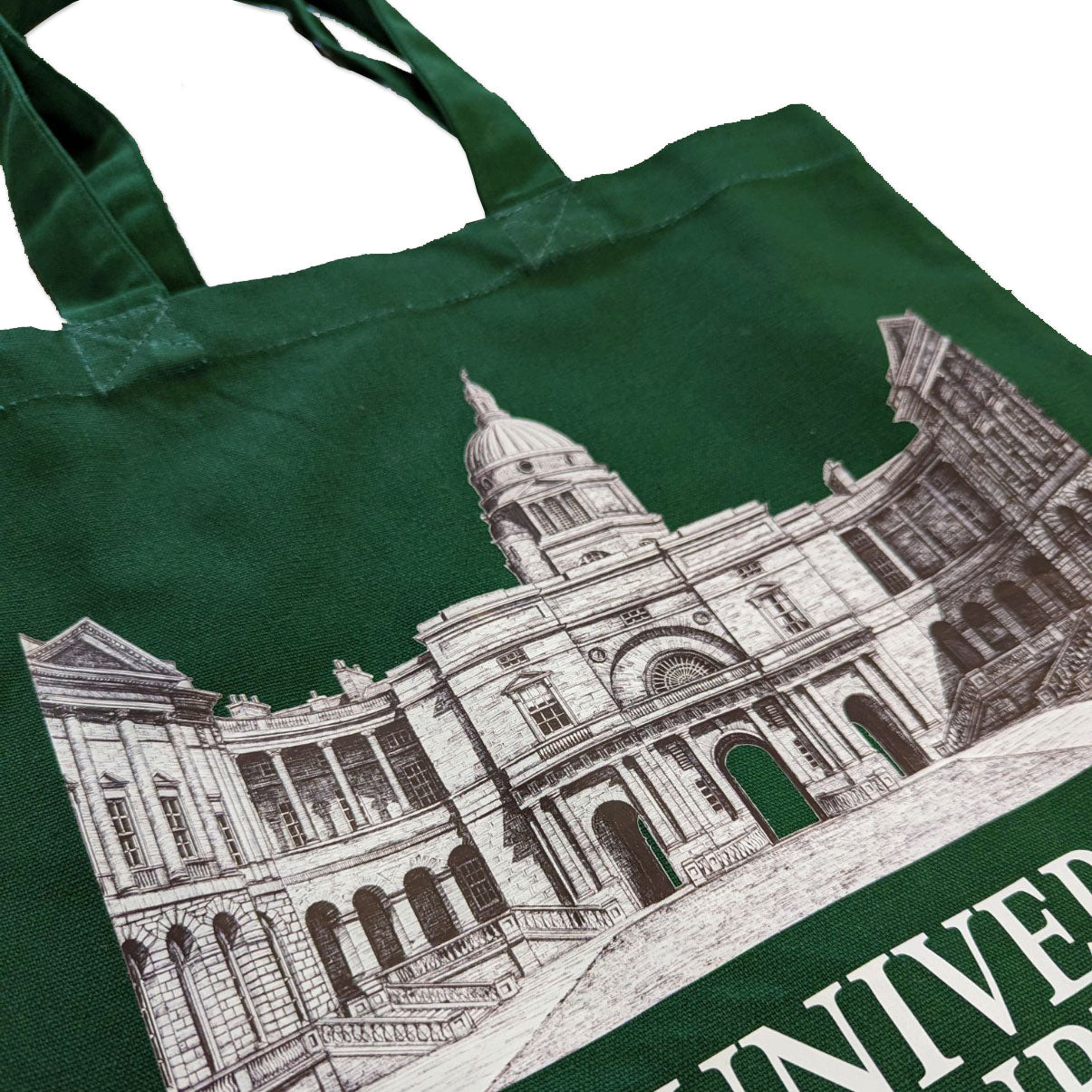 Close up of the Old College Building design on the green tote.