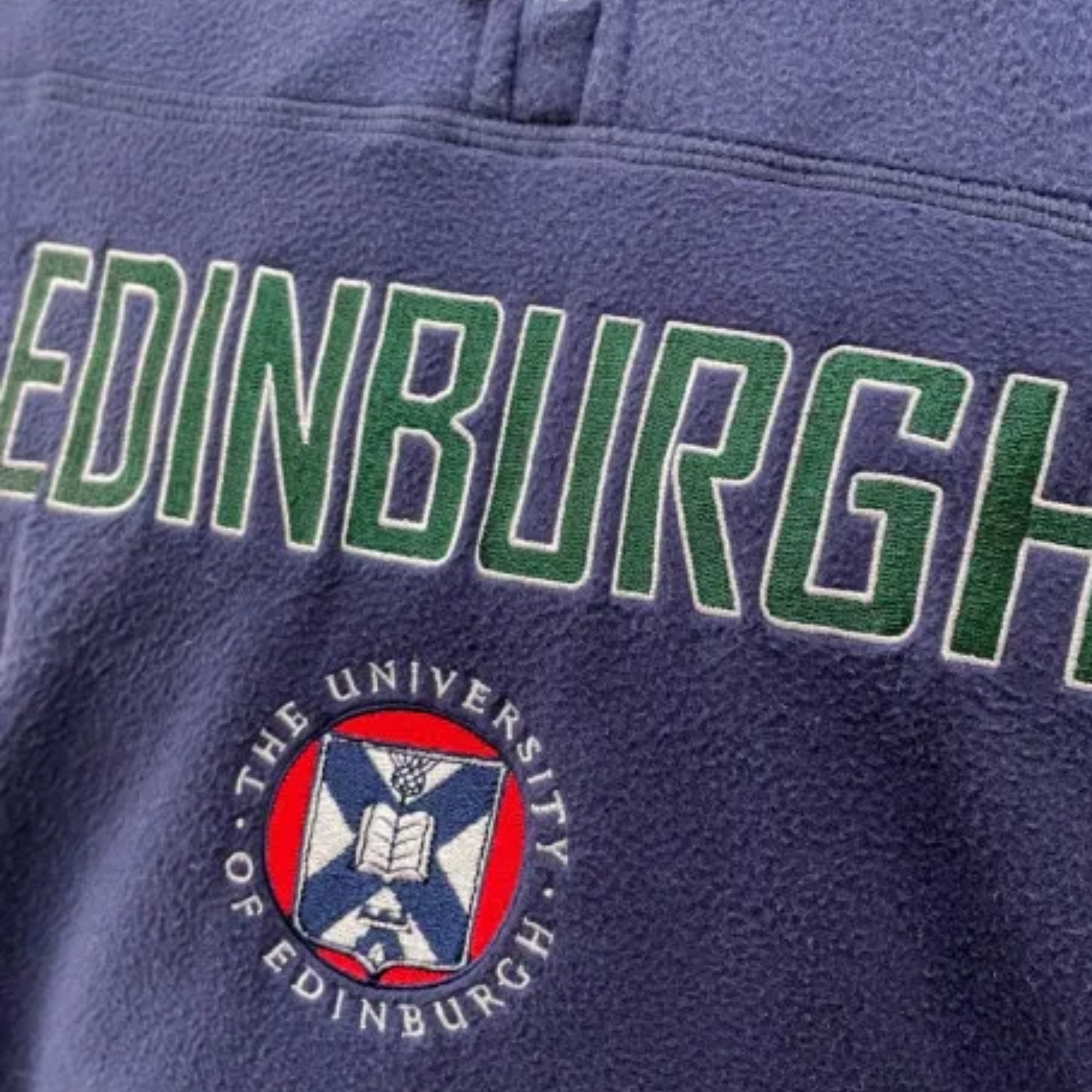 Close up of 'EDINBURGH' and University crest embroidery.