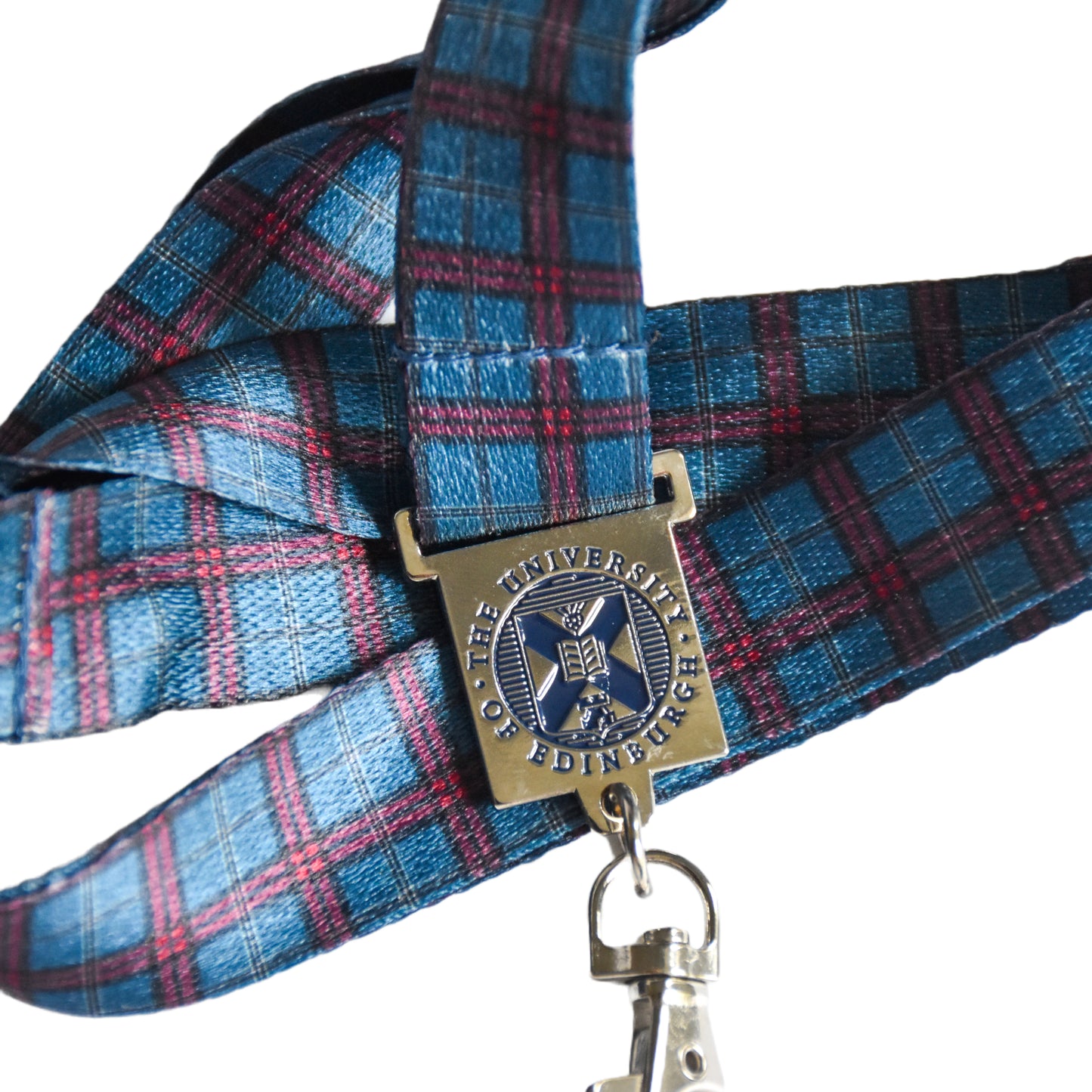 Close-up of metal University Crest detail on University Tartan Lanyard.