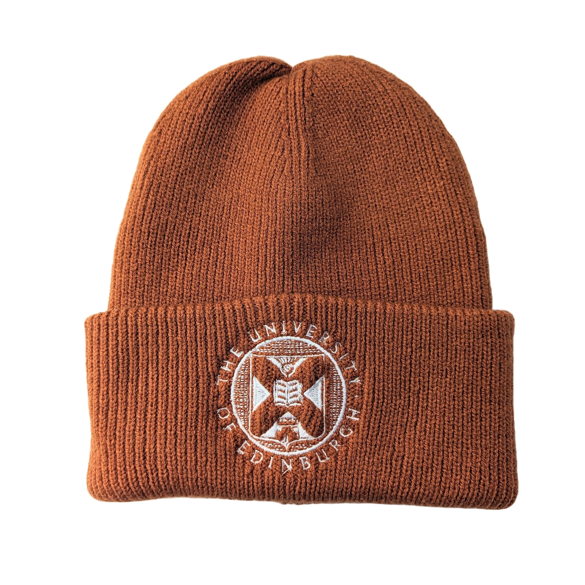 rust orange ribbed cotton beanie with white embroidered university crest