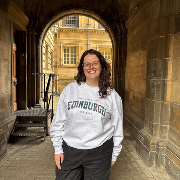 Model wears our Tartan Print Sweatshirt at the Old Medical School.