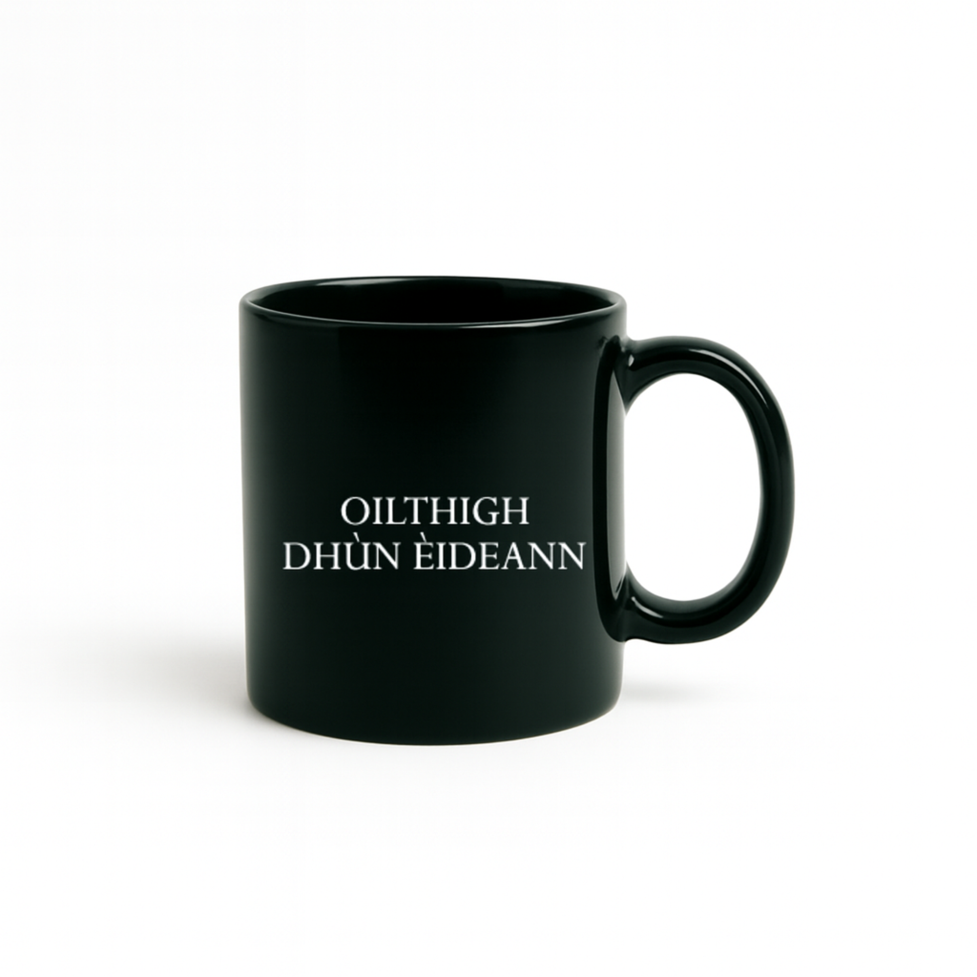 dark green mug with white text reading 'Oilthigh Dhùn Èideann'. Oilthigh Dhùn Èideann means the University of Edinburgh in Scottish Gaelic.