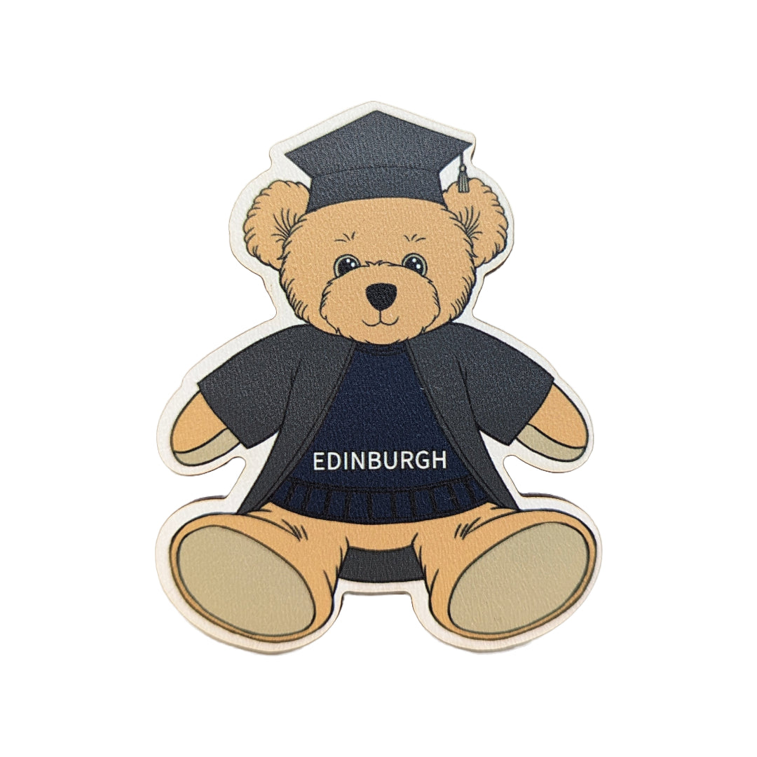 Wooden Edinbear Magnet - a design of a bear in a cap and gown, with an Navy Edinburgh jumper on.