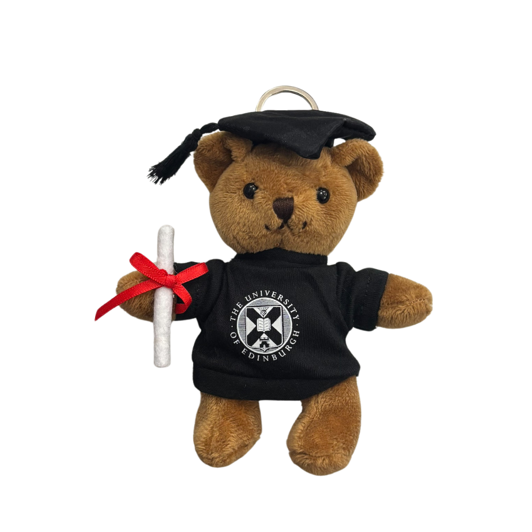 Graduation-themed teddy bear Keyring with a cap, tassel, and diploma on a white background