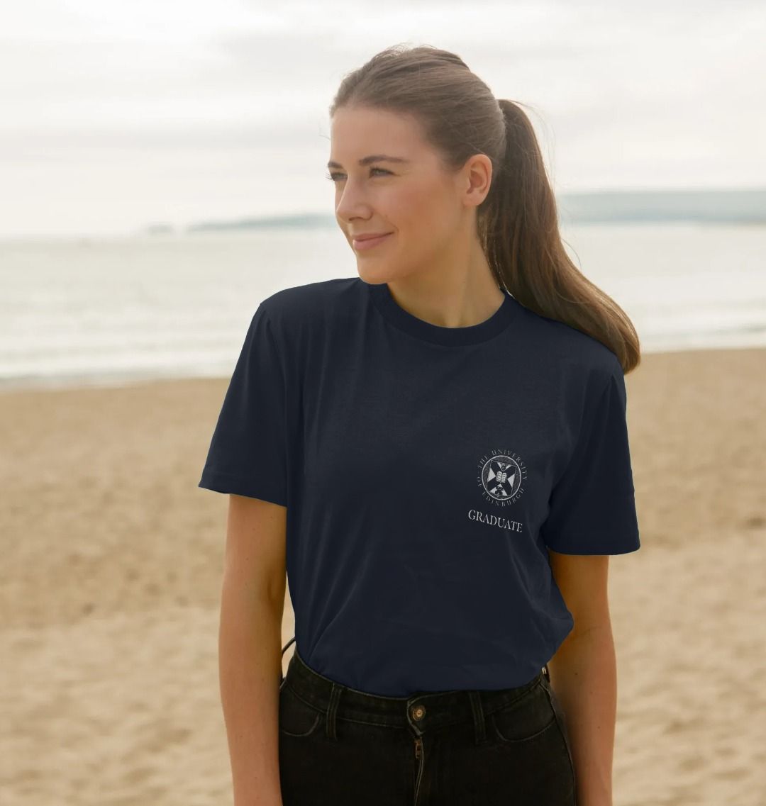 Model wears Navy Blue School of Divinity 'Class Of' Graduate T-Shirt showing front design.