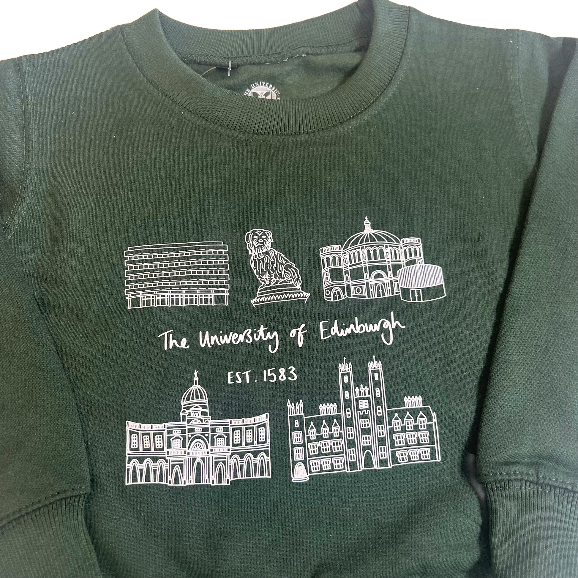 Light blue sweatshirt with white illustration of the main library, greyfriars bobby, mcewan hall, old college, new college, and text saying 'the university of edinburgh established 1583