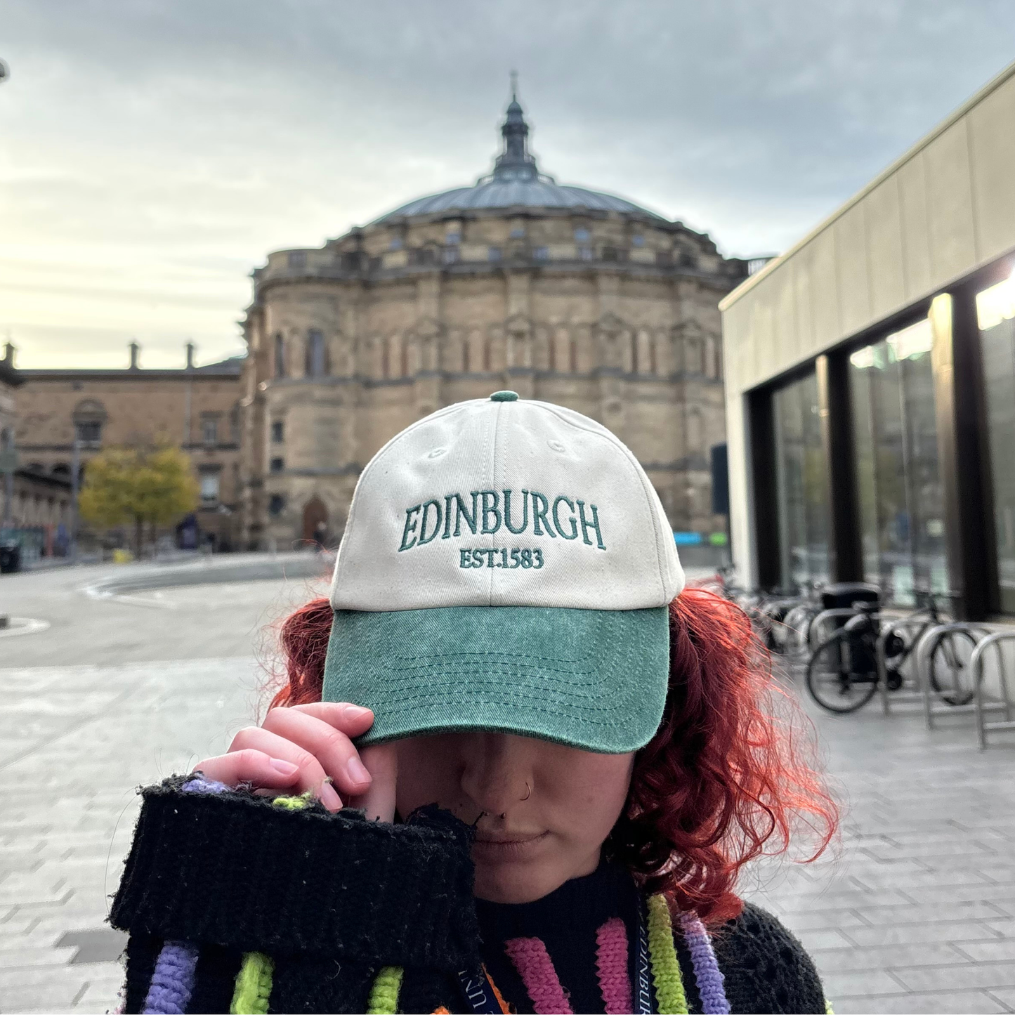 Model wears Vintage Edinburgh Contrast Baseball Cap in front of McEwan Hall.