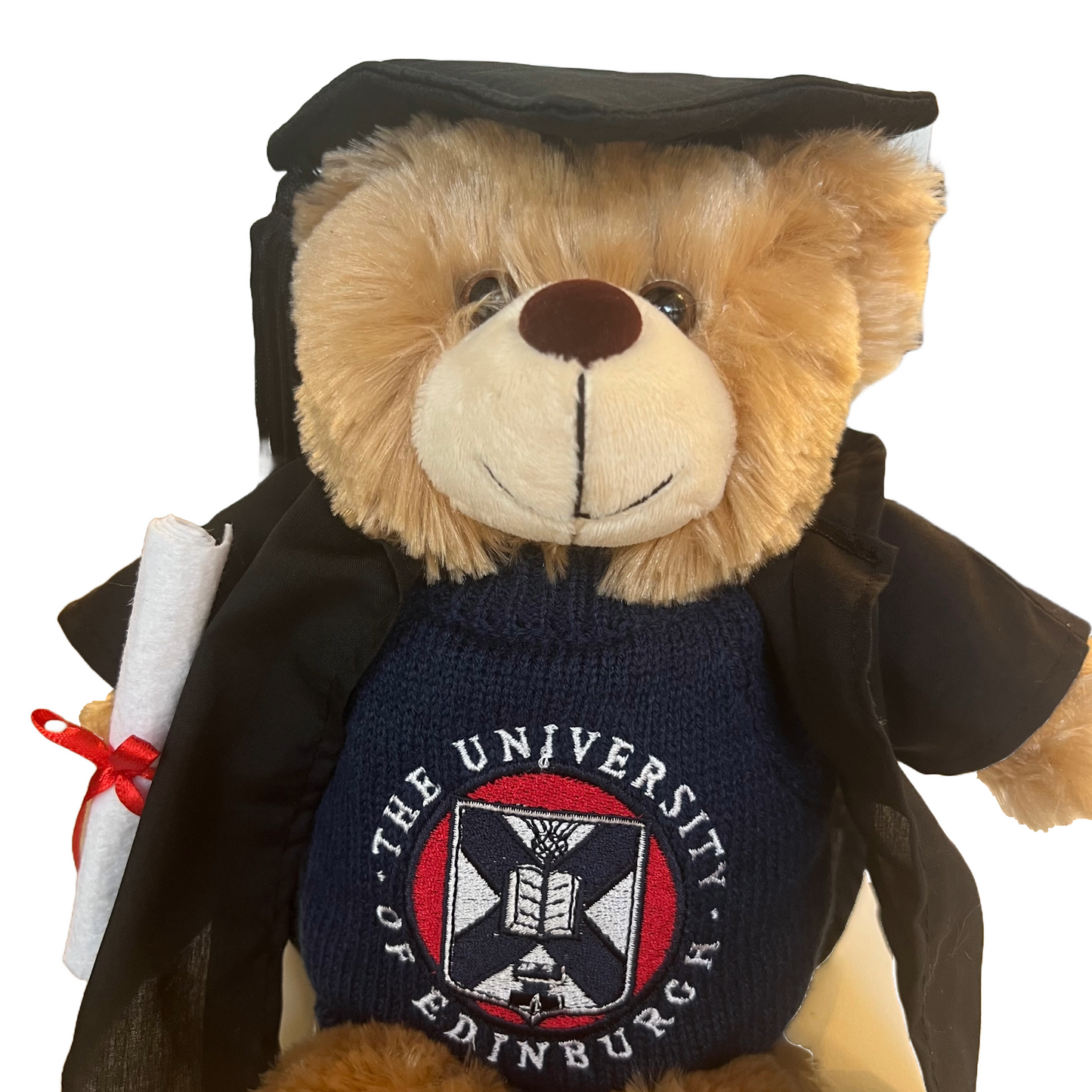 Brown teddy bear wearing knitted navy jumper with university crest embroidered, with graduation cap, gown and scroll